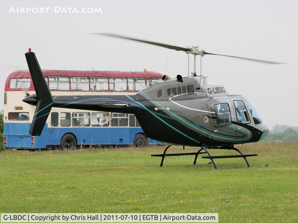 G-LBDC, 1984 Bell 206B JetRanger III C/N 3806, being used for ferrying race fans to the British F1 Grand Prix at Silverstone