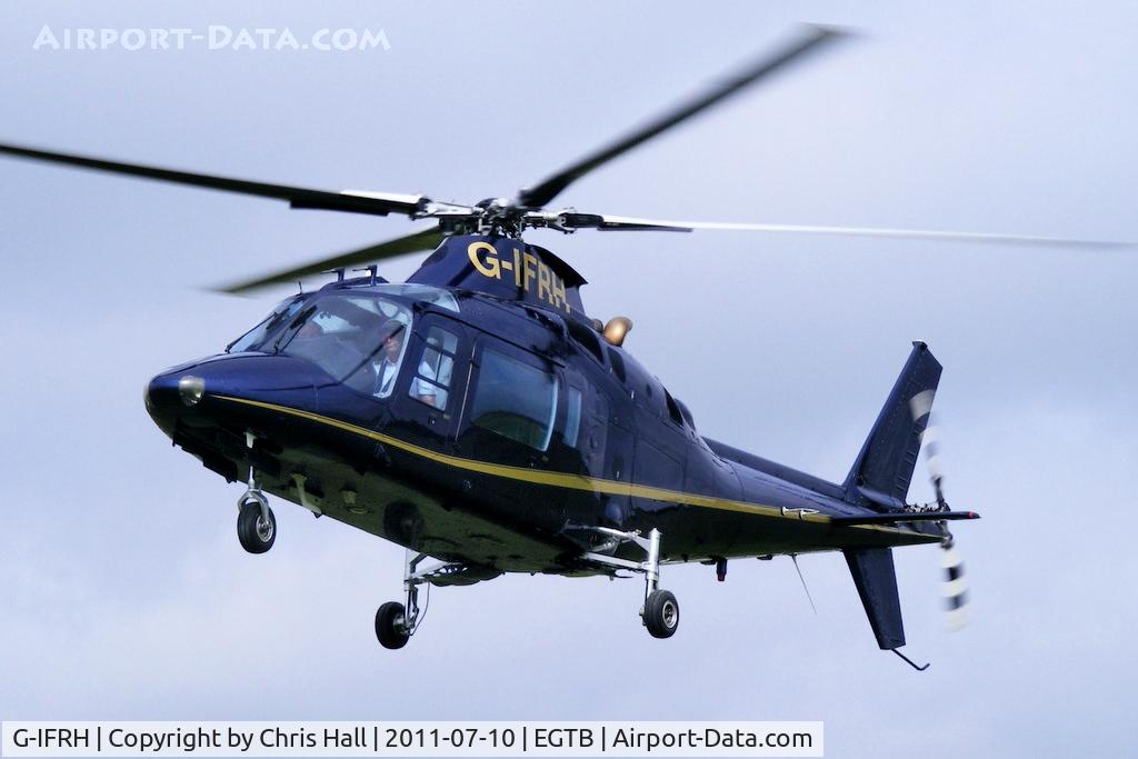G-IFRH, 1990 Agusta A-109C C/N 7619, being used for ferrying race fans to the British F1 Grand Prix at Silverstone