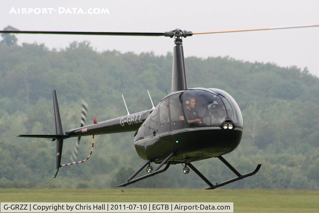 G-GRZZ, 2008 Robinson R44 Raven II C/N 12149, being used for ferrying race fans to the British F1 Grand Prix at Silverstone