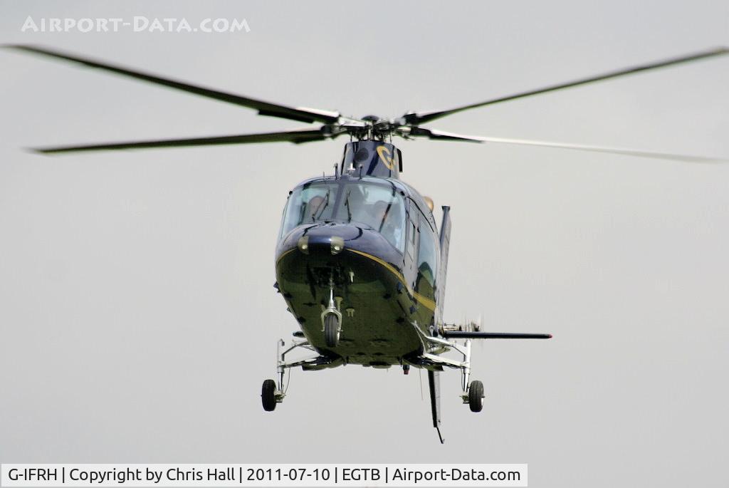 G-IFRH, 1990 Agusta A-109C C/N 7619, being used for ferrying race fans to the British F1 Grand Prix at Silverstone