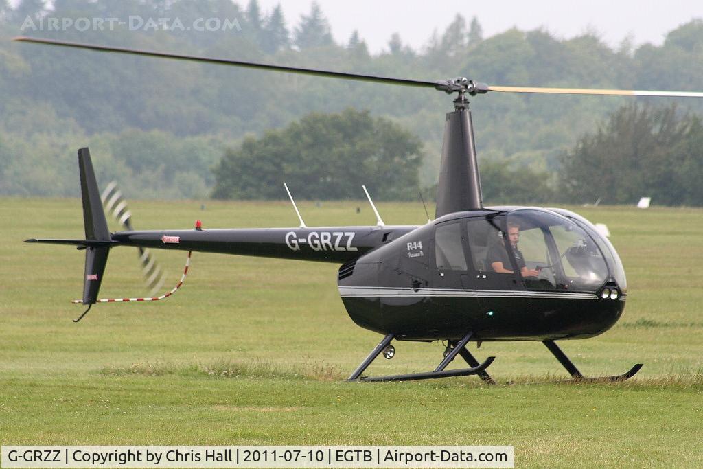G-GRZZ, 2008 Robinson R44 Raven II C/N 12149, being used for ferrying race fans to the British F1 Grand Prix at Silverstone