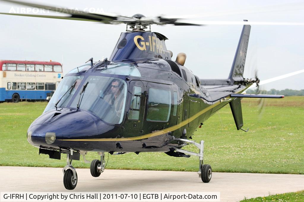 G-IFRH, 1990 Agusta A-109C C/N 7619, being used for ferrying race fans to the British F1 Grand Prix at Silverstone