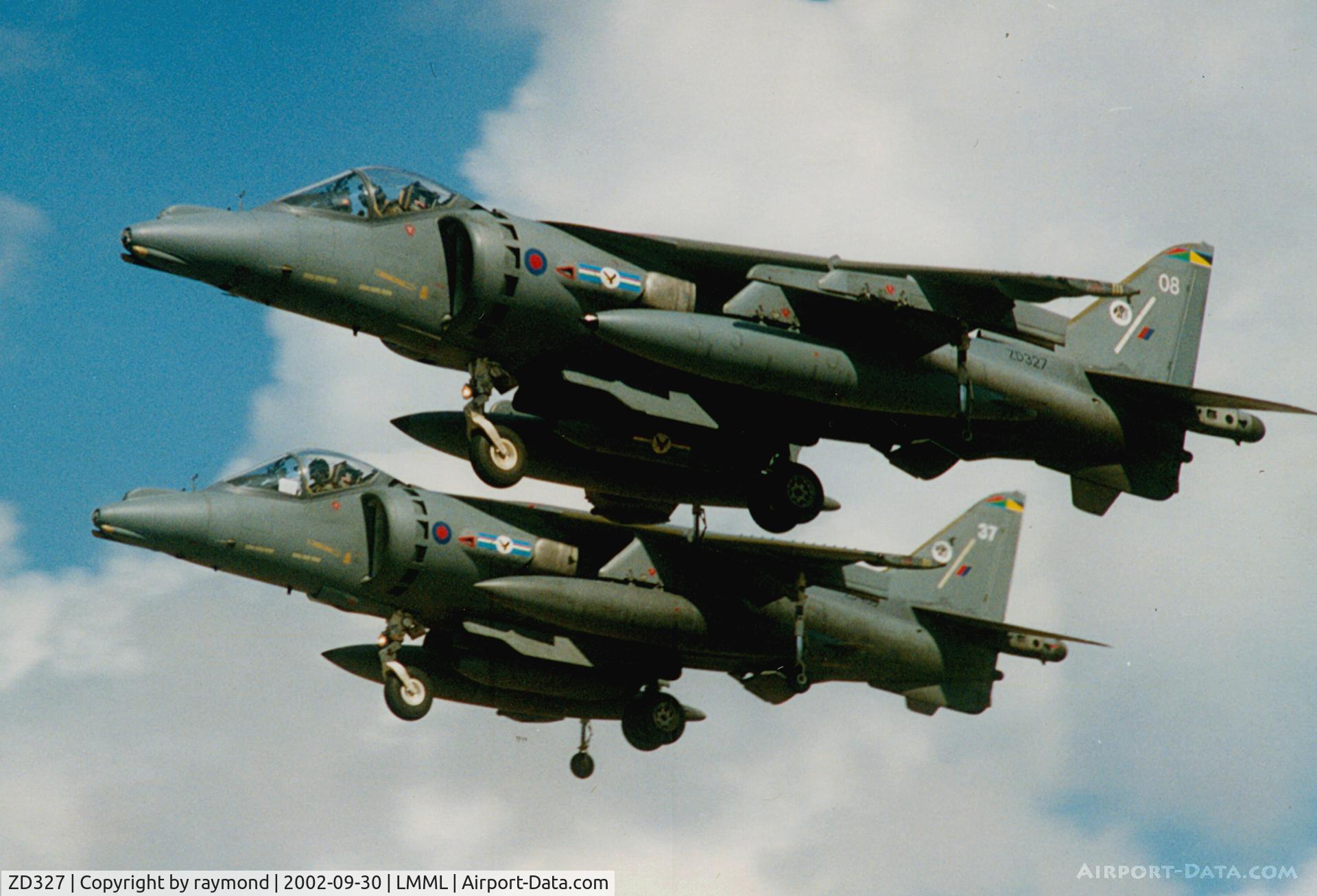 ZD327, British Aerospace Harrier GR.9A C/N 512115/P8, Harriers GR9s ZD327/08 & ZD408/37 of No20Sqd RAF leaving Luqa after their participation in the Malta International Airshow 2002.