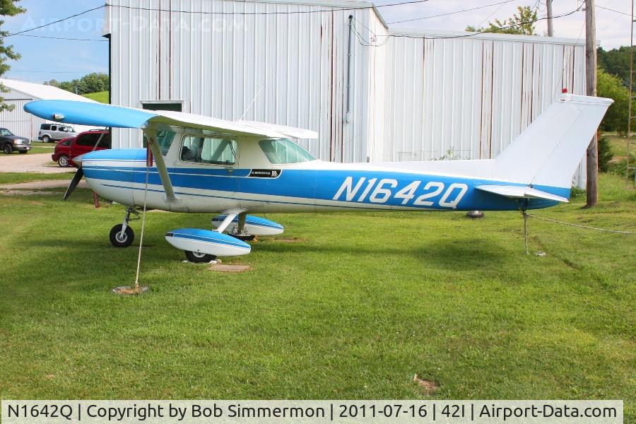 N1642Q, Cessna 150L C/N 15072942, Tied down at Parr field during the EAA fly-in at Zanesville, Ohio