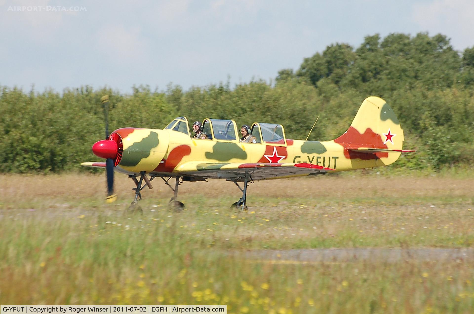 G-YFUT, 1988 Bacau Yak-52 C/N 888410, Osprey 1 returning from formation aerobatics practice.