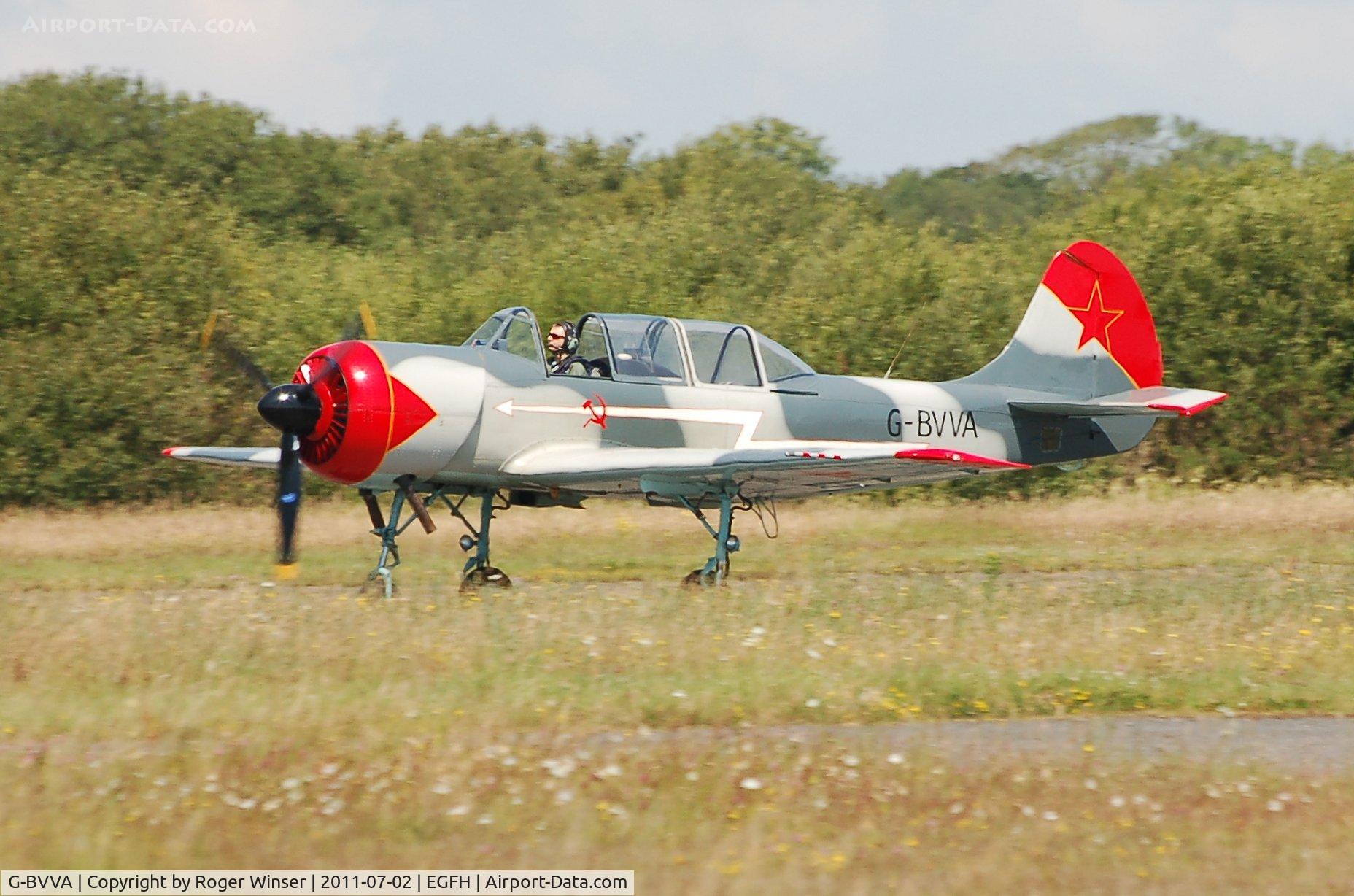 G-BVVA, 1987 Bacau Yak-52 C/N 877610, Osprey 2 returning from formation aerobatics practice.