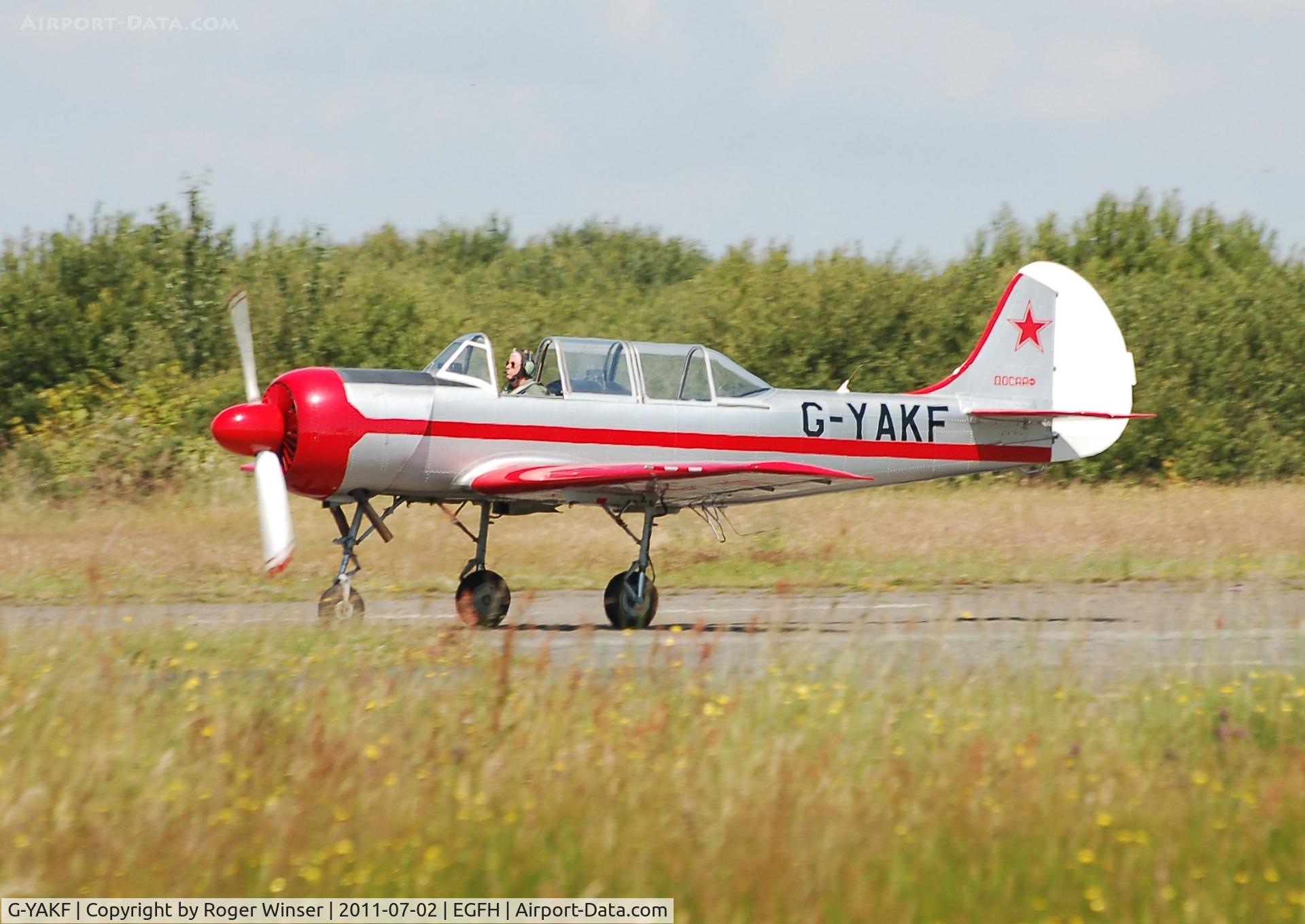 G-YAKF, 1991 Yakovlev (Aerostar) Yak-52 C/N 9111205, Osprey 3 returning from formation aerobatics practice.