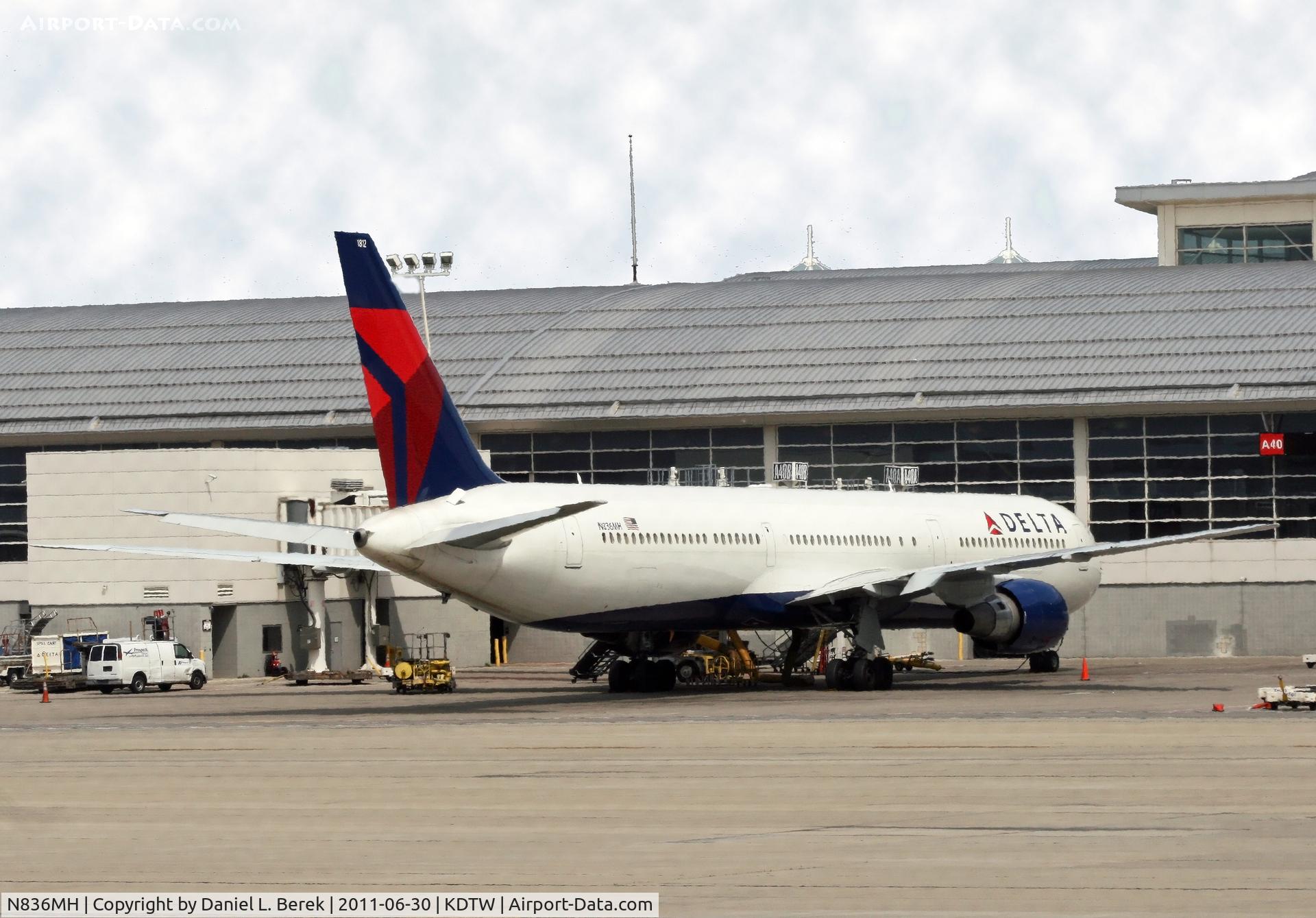 N836MH, 2000 Boeing 767-432/ER C/N 29709, A Delta 767-400, one of only two airlines to operate this variant, sits at DTW, in front of the picture window where the fountain is.