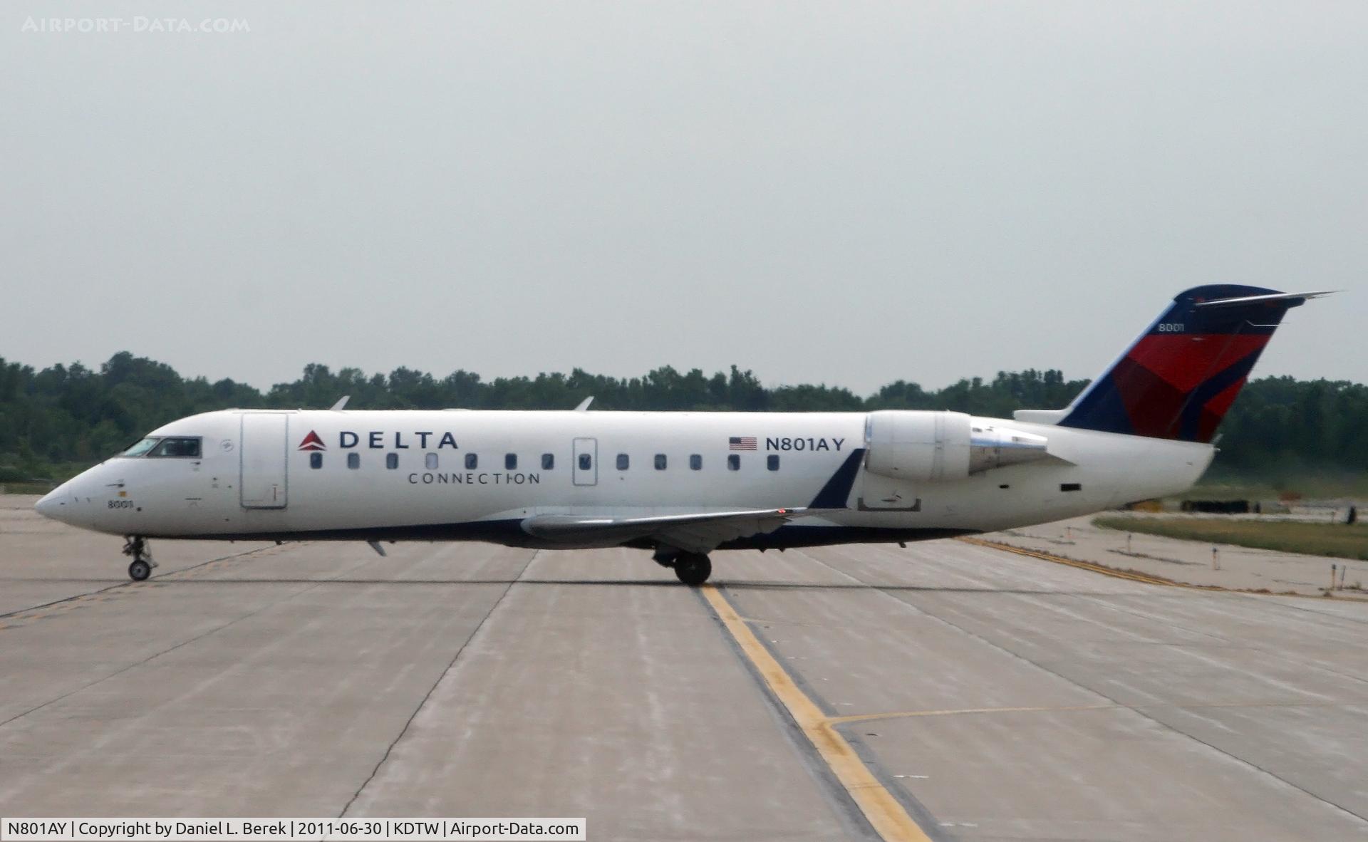 N801AY, 2004 Bombardier CRJ-200ER (CL-600-2B19) C/N 8001, Having dispensed with the tow truck, a Delta Connection CRJ gets ready for another trip from DTW.