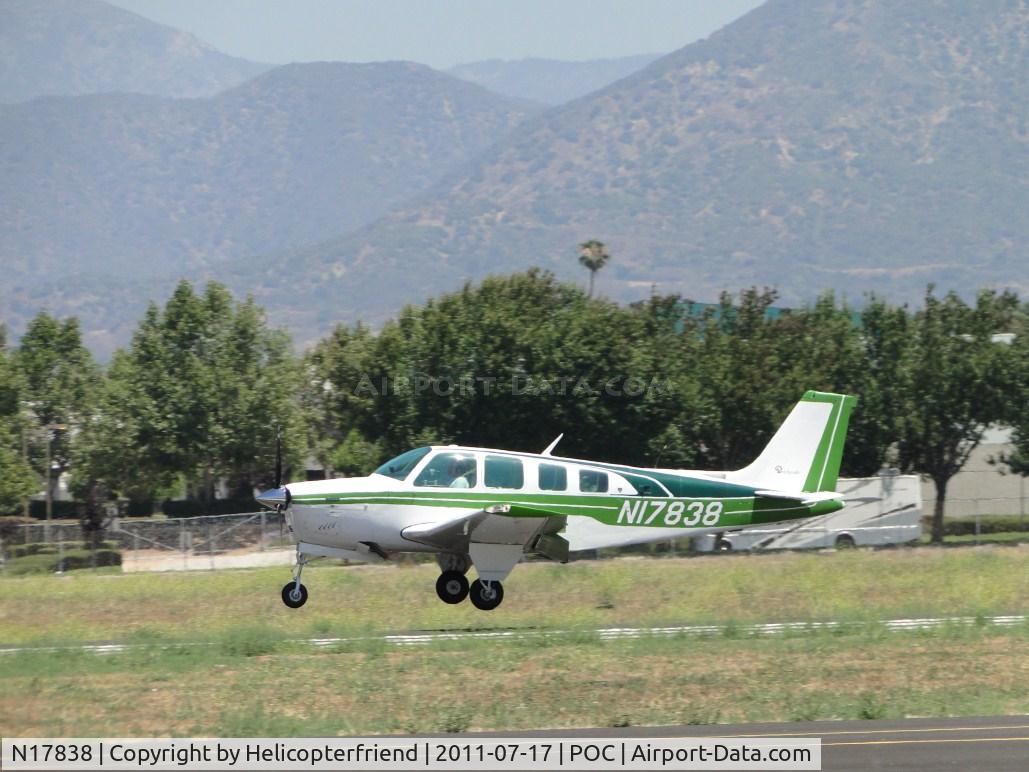 N17838, 1977 Beech A36 Bonanza 36 C/N E-1046, Slowly coming down for a three point landing on runway 26L