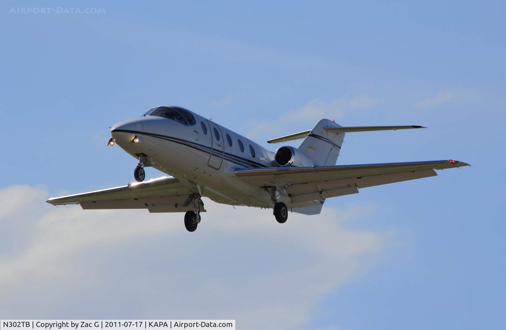 N302TB, 2004 Raytheon Aircraft Company 400A C/N RK-384, Landing 17L.