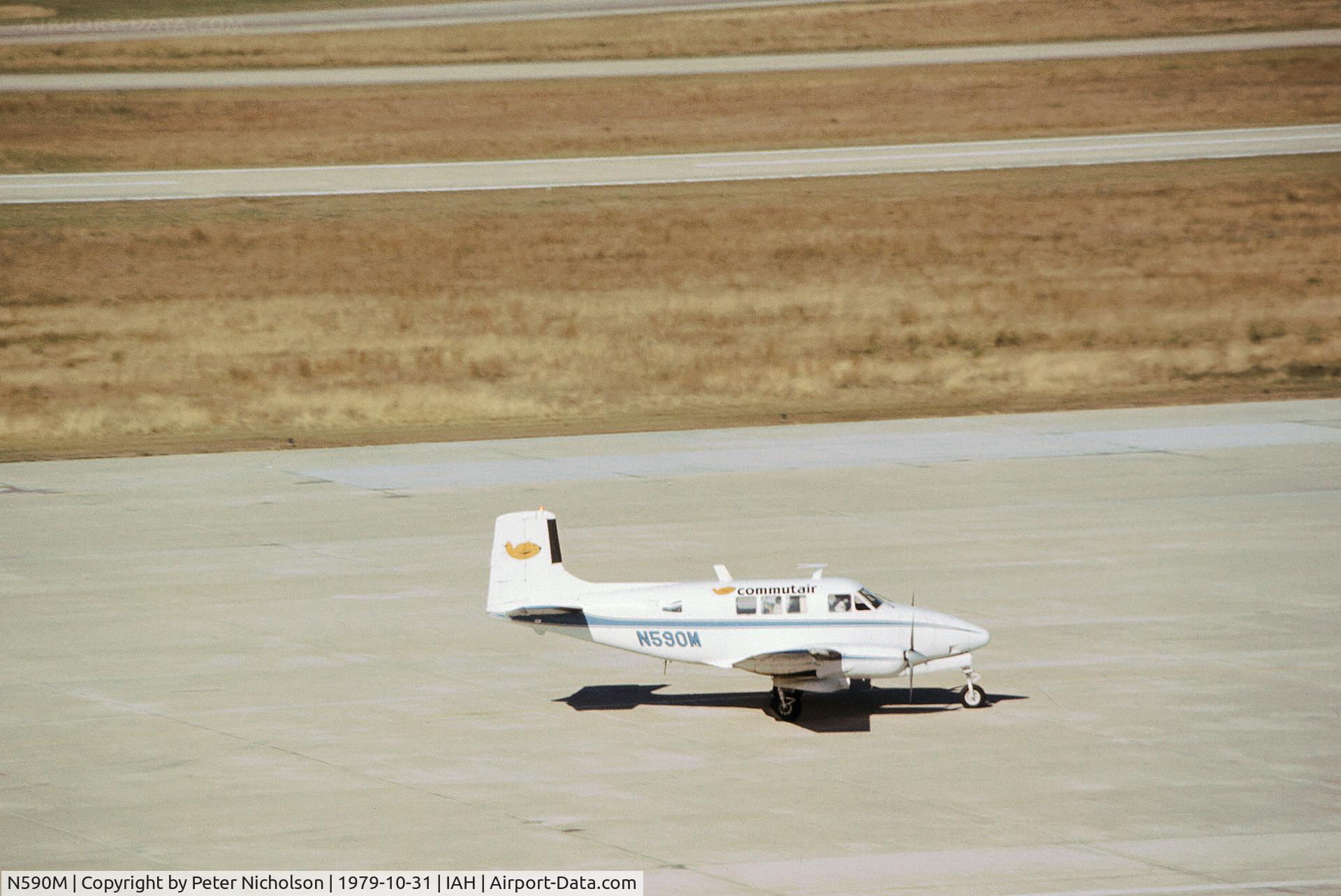 N590M, 1960 Beech 65 C/N LC-46, Beech Queen Air of Commutair arriving at Houston International in October 1979.