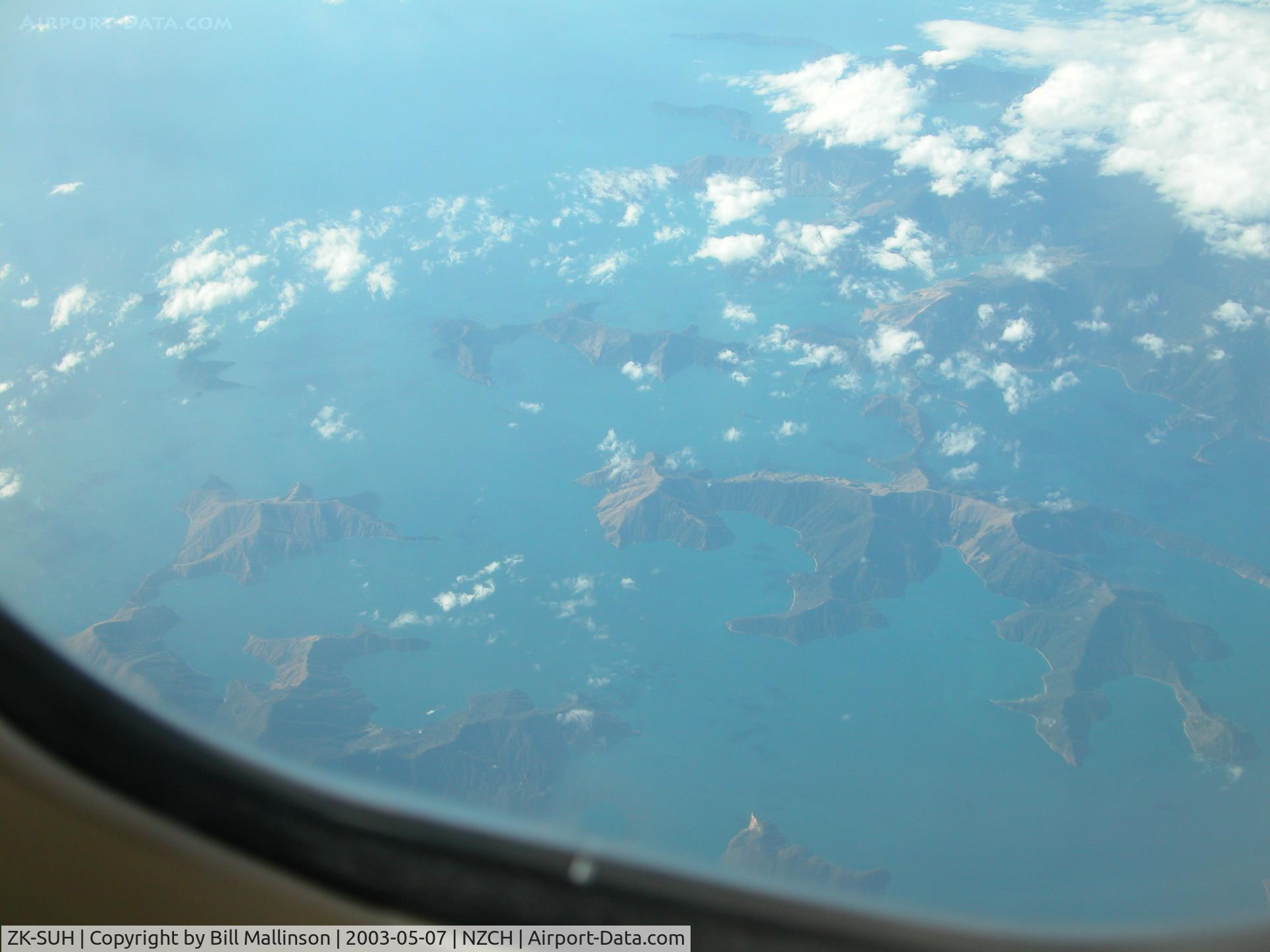 ZK-SUH, 1991 Boeing 747-475 C/N 24896, Marlborough Sounds from seat 55K at FL390