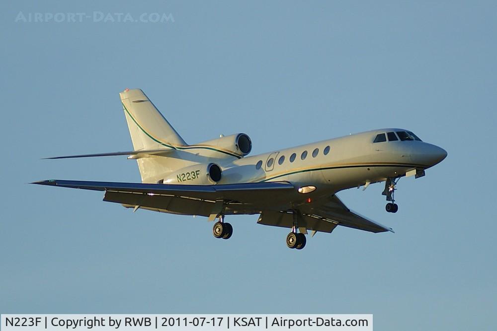 N223F, 2002 Dassault Mystere Falcon 50 C/N 328, Landing 12R at sunset
