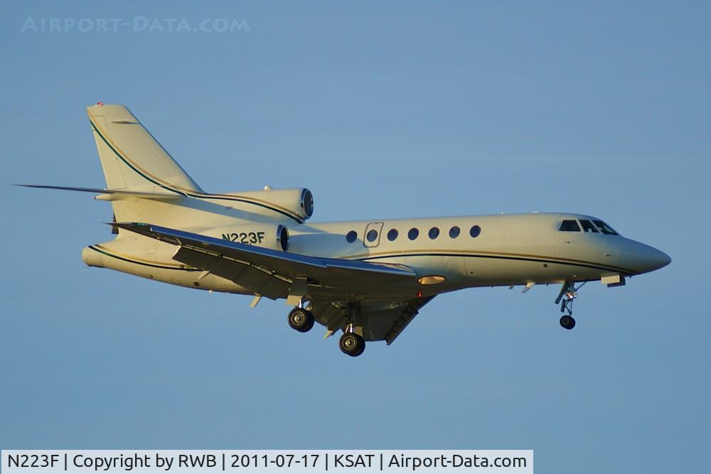 N223F, 2002 Dassault Mystere Falcon 50 C/N 328, Landing 12R at sunset