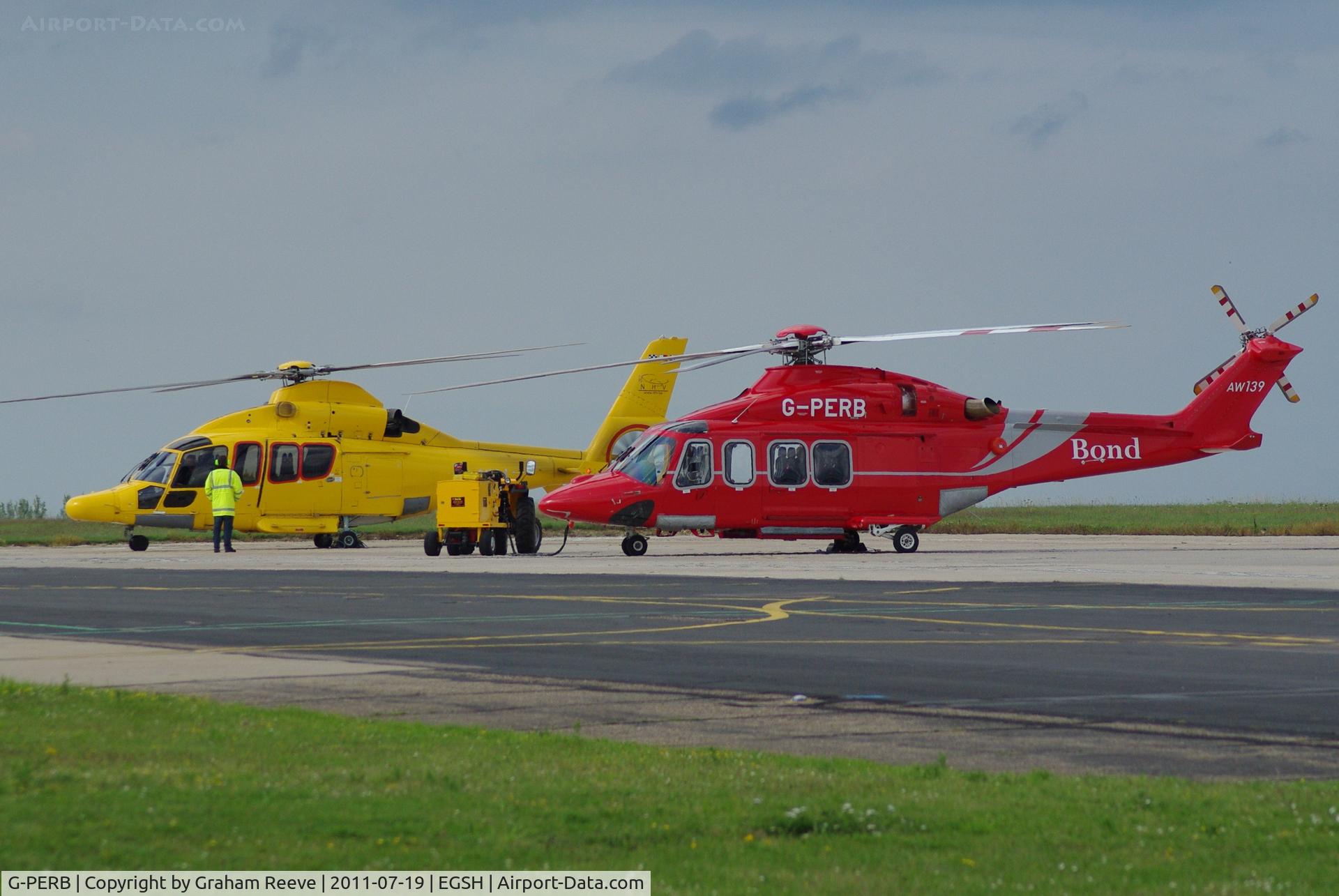 G-PERB, 2011 AgustaWestland AW-139 C/N 41261, With OO-NHJ in the back ground.