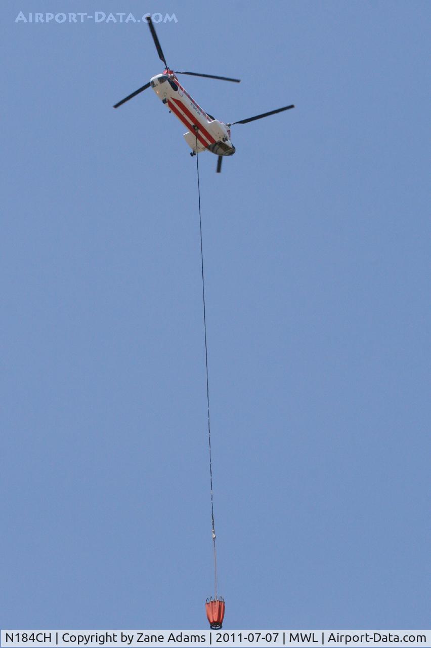 N184CH, 1962 Boeing Vertol (Kawasaki) KV107-11 C/N 4001, Type 1 firefighting helicopter with water bucket at Mineral Wells, TX