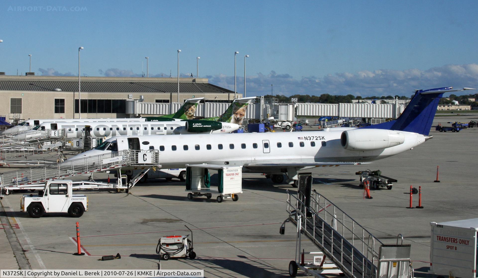 N372SK, 2001 Embraer ERJ-140LR (EMB-135KL) C/N 145538, Wearing a hybrid Midwest scheme, this aircraft now flies for Frontier; the same plane also served American.