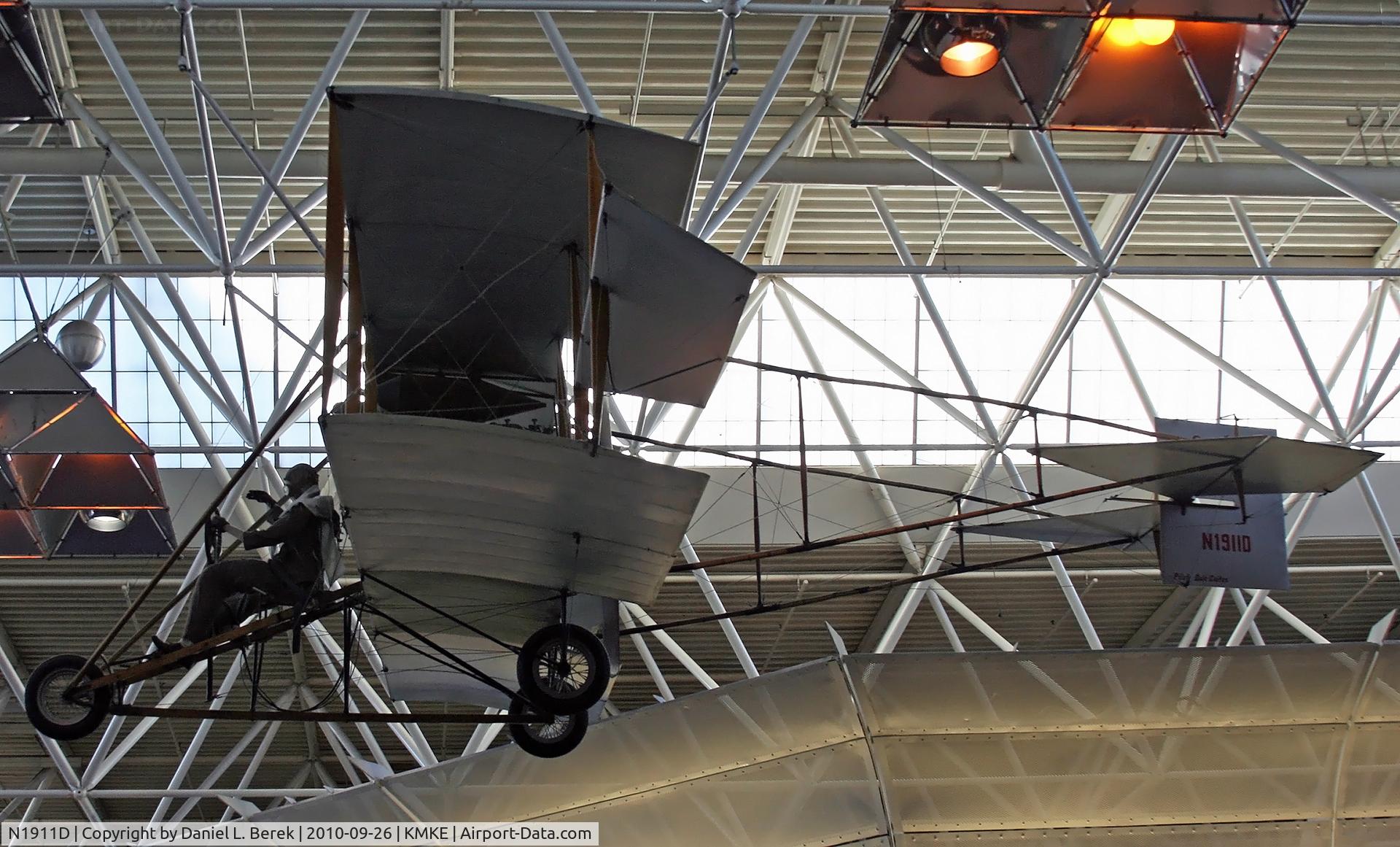 N1911D, 1974 Curtiss Pusher E8-90 Replica C/N C3, This faithful replica of a Curtiss biplane was built in 1974.  It now graces the main terminal of General Mitchell International Airport, Milwaukee, WI.