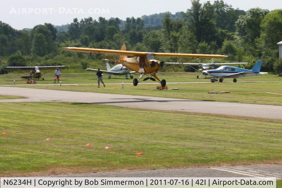 N6234H, 1946 Piper J3C-65 Cub C/N 19408, Low pass at the EAA fly-in at Zanesville, Ohio