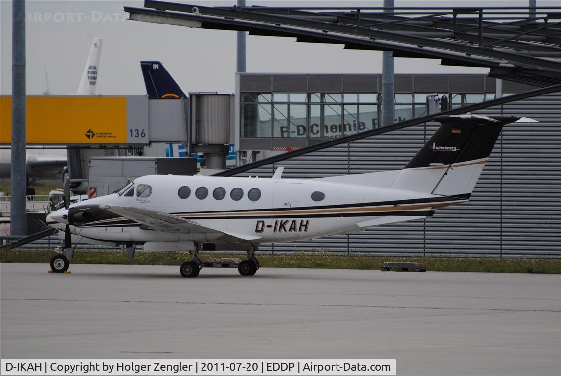 D-IKAH, 2008 Hawker Beechcraft B200GT King Air C/N BY-50, View thru GAT´s fence......