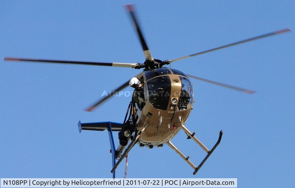 N108PP, 2008 MD Helicopters 369E C/N 0578E, FTO Cooper taking a last look and insuring clearance of objects, before letting the pilot turn the ship