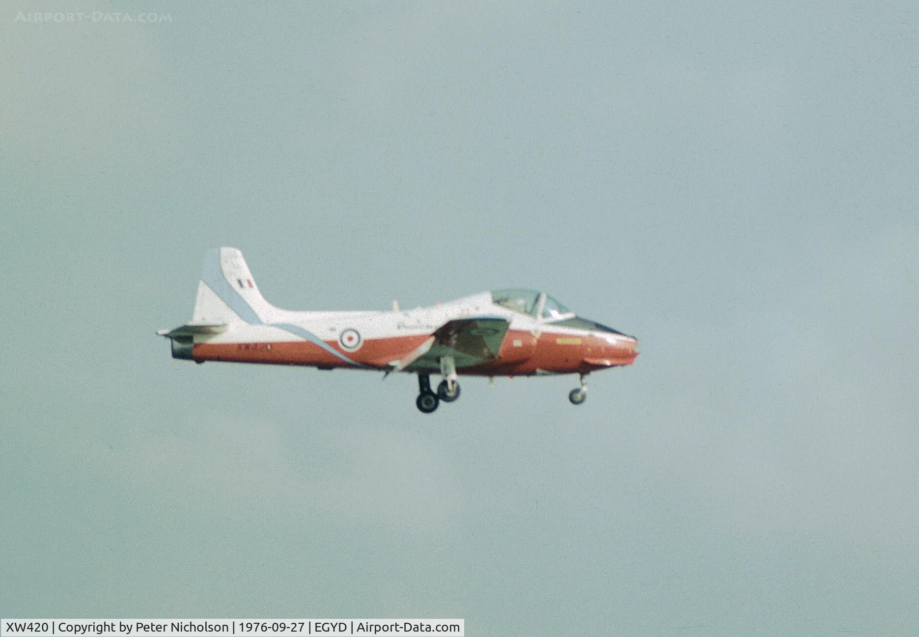 XW420, 1971 BAC 84 Jet Provost T.5A C/N EEP/JP/1042, Jet Provost T.5A of the RAF College's Poachers aerobatic display team returning to RAF Cranwell in September 1976.