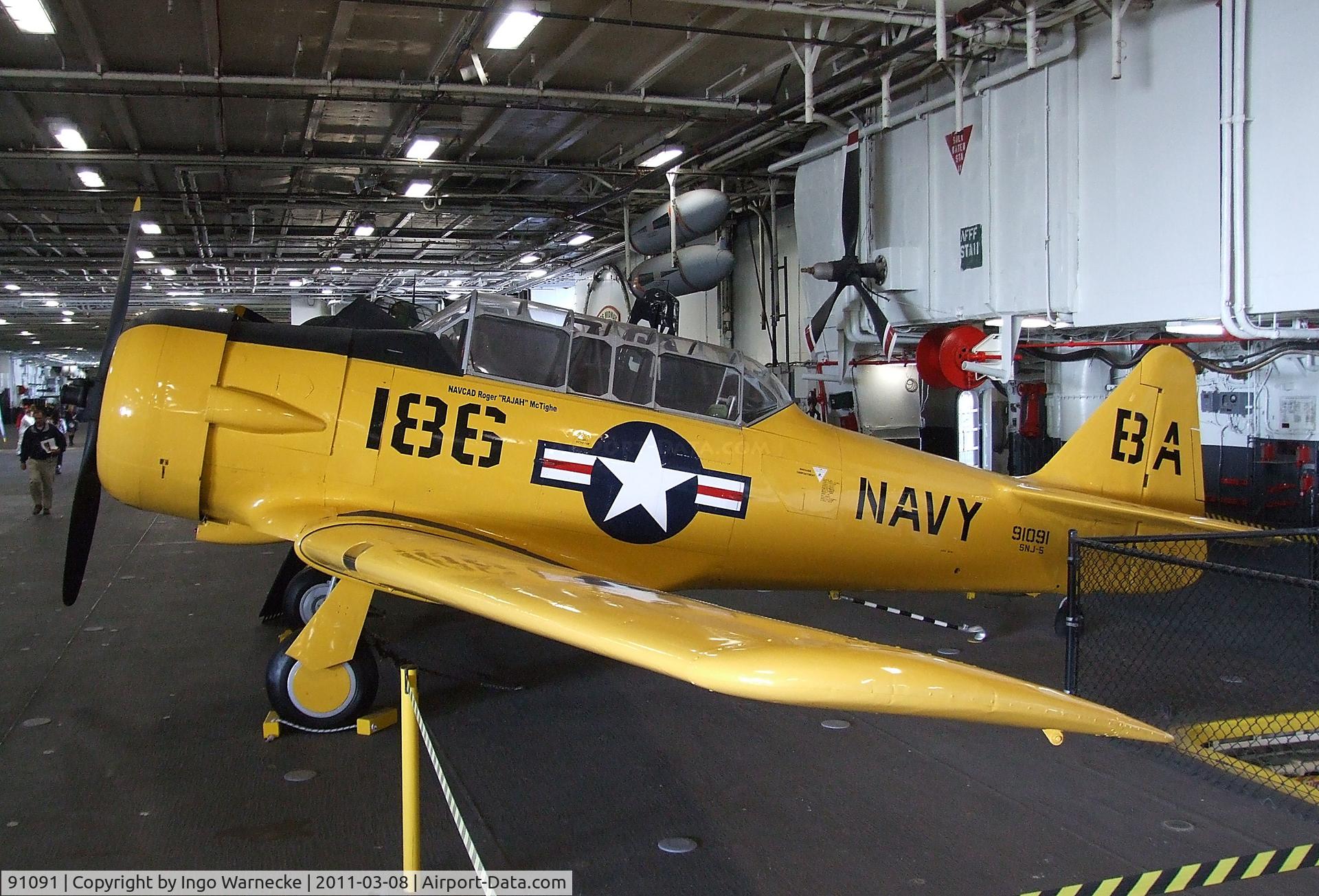 91091, North American SNJ-5 Texan Texan C/N 121-42107, North American SNJ-5 Texan in the Hangar of the USS Midway Museum, San Diego CA