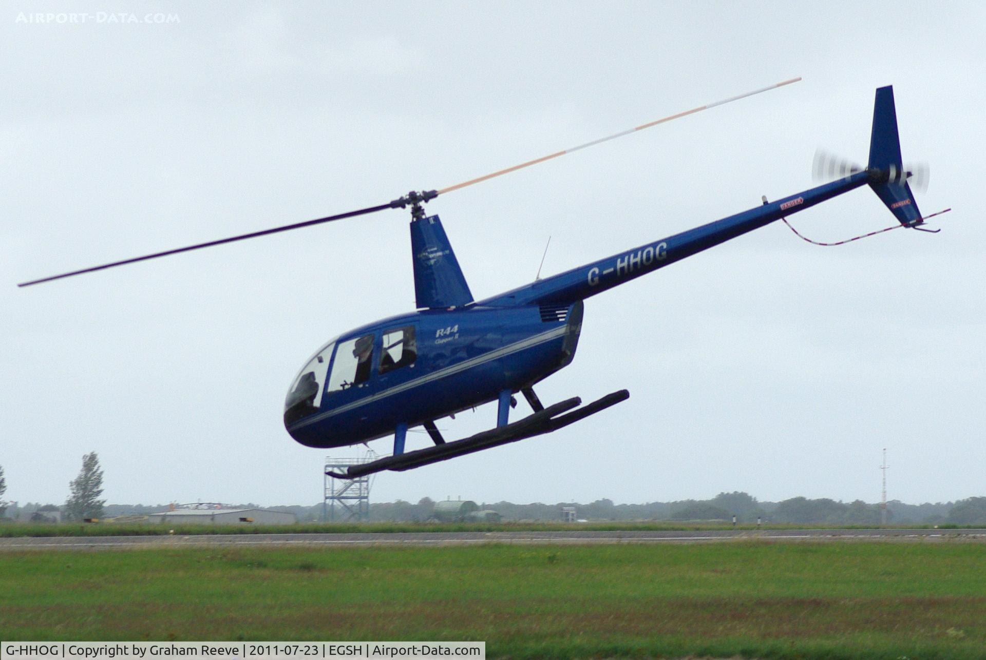 G-HHOG, 2004 Robinson R44 Clipper II C/N 10584, Departing from Norwich.