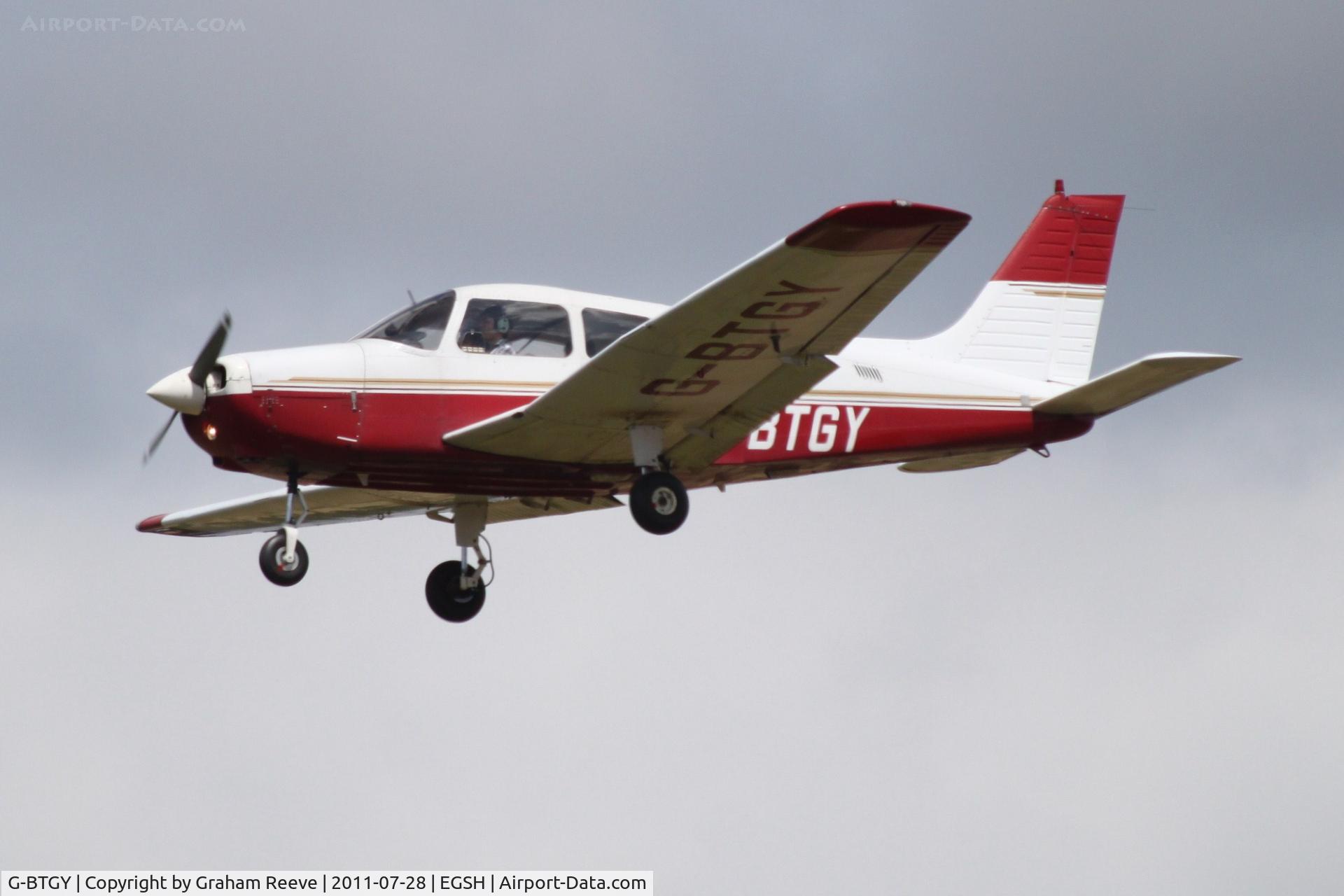 G-BTGY, 1982 Piper PA-28-161 Cherokee Warrior II C/N 28-8216199, About to touch down.
