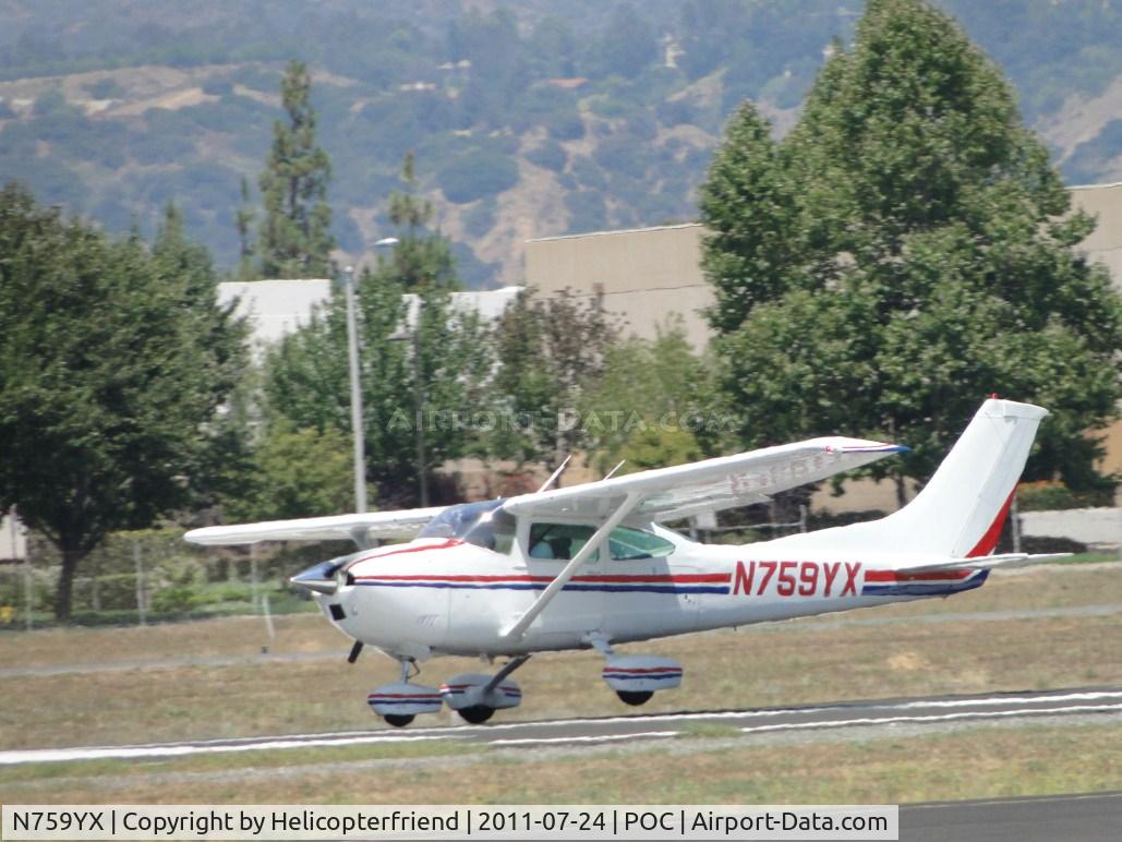 N759YX, 1978 Cessna 182Q Skylane C/N 18266375, Lifting off runway 26L, notice left main wheel came up first, strong cross wind