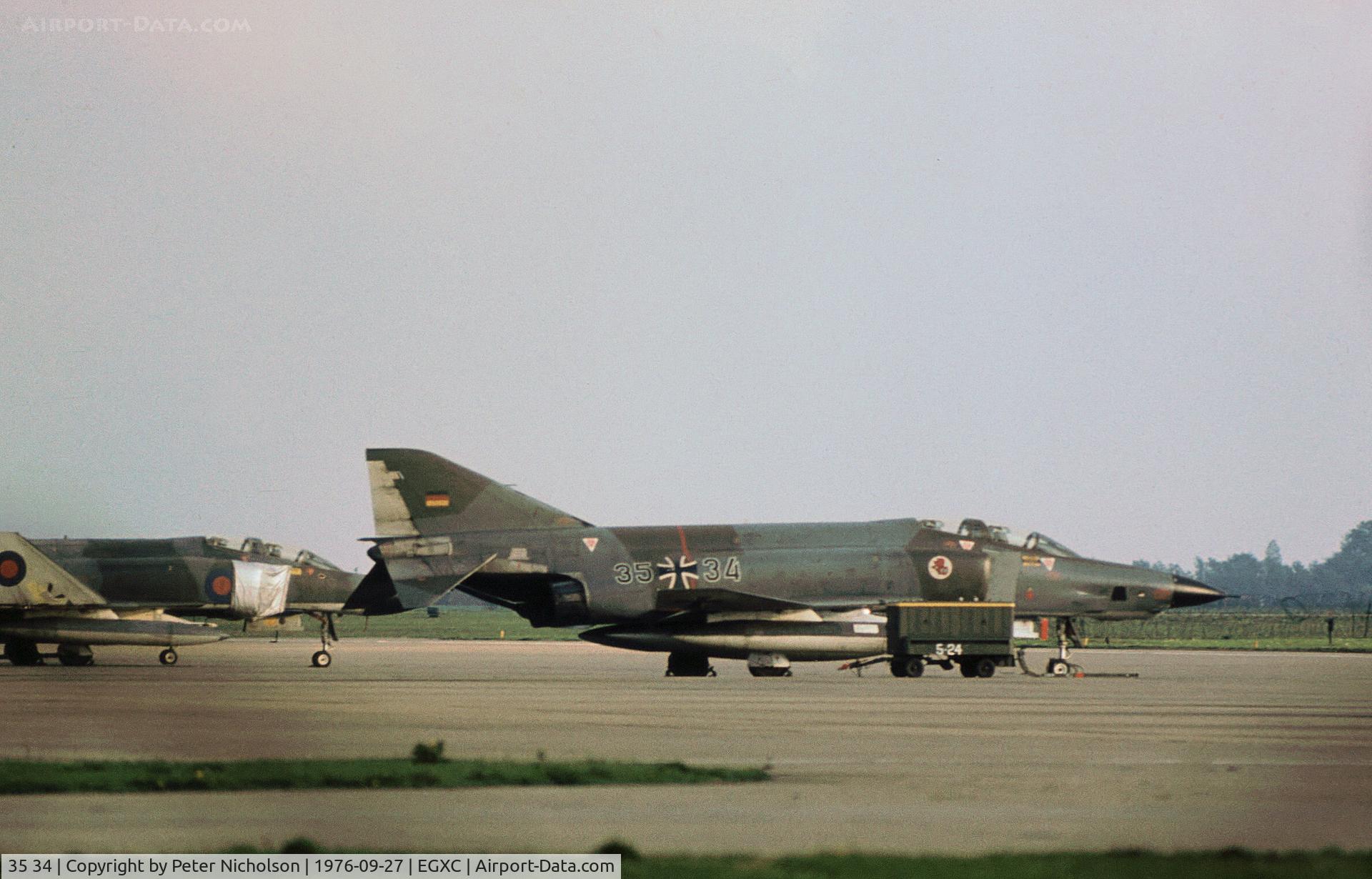 35 34, 1969 McDonnell Douglas RF-4E Phantom II C/N 4090, RF-4E Phantom of AKG-51 on the flight-line at RAF Coningsby in September 1976.