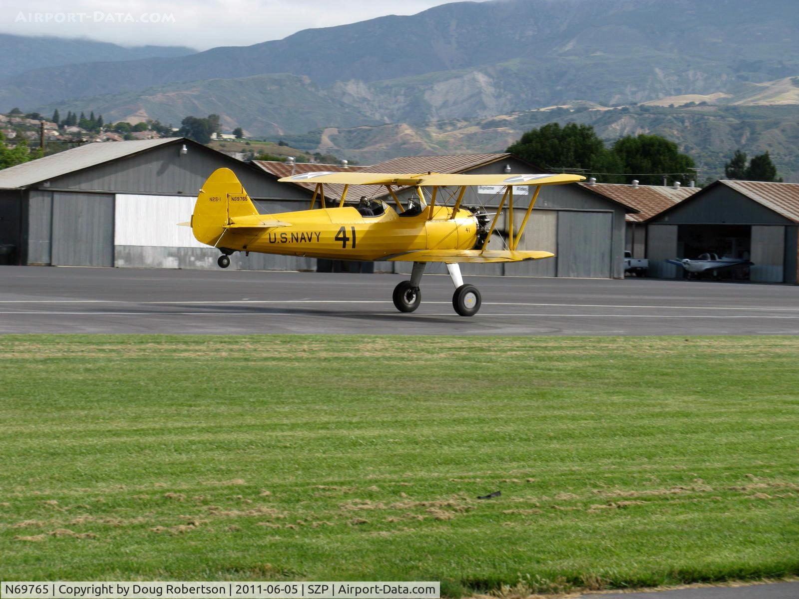 N69765, 1941 Boeing A75N1 (PT17) C/N 75-1044, 1941 Boeing Stearman A75N1 as Navy N2S1, Continental W670-5 220 Hp, landing roll Rwy 04
