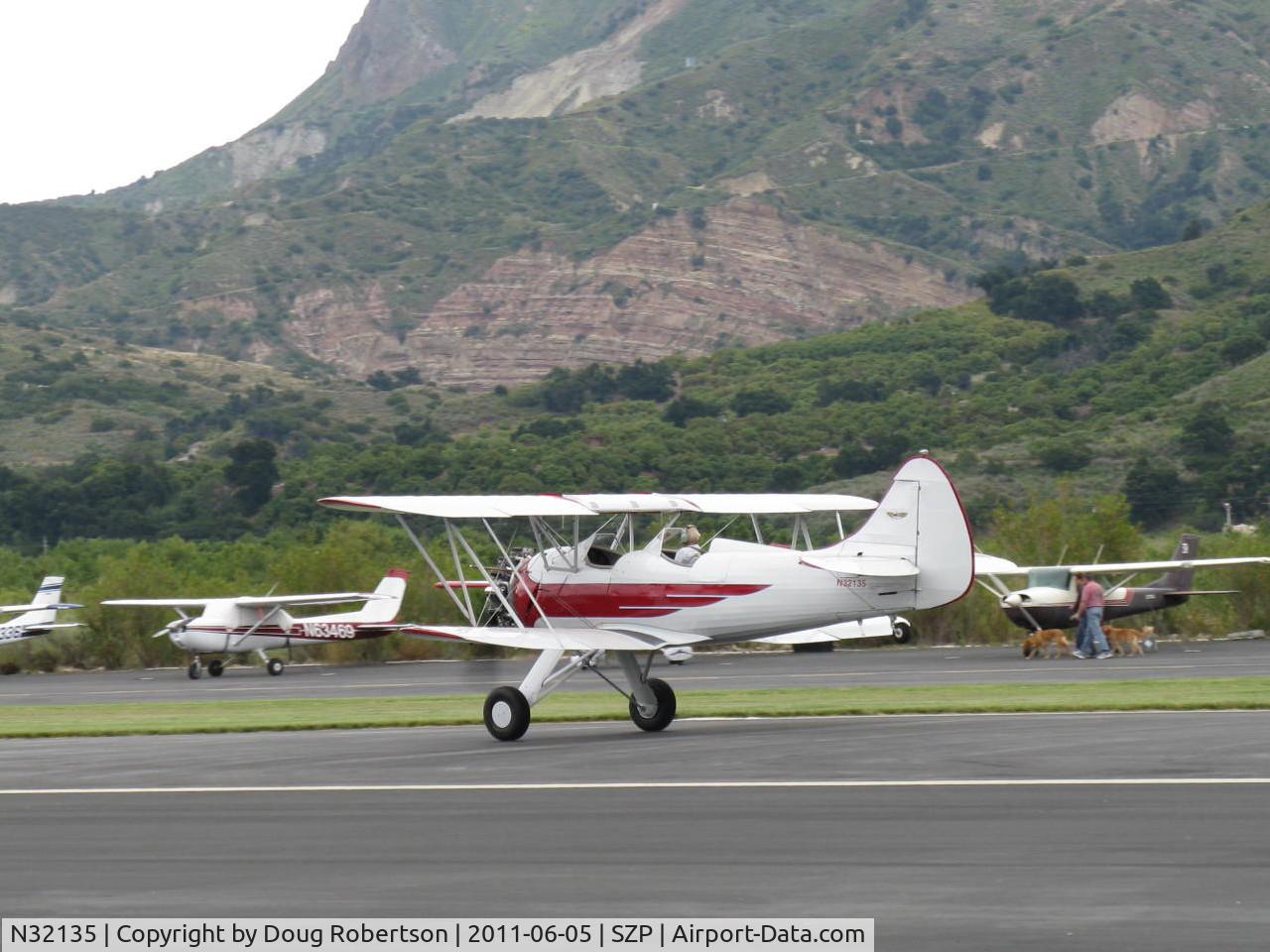 N32135, 1941 Waco UPF-7 C/N 5767, 1941 Waco UPF-7, Continental W-670 220 Hp, stunning show plane, chromed engine and prop, one of the prettiest classic biplanes, takeoff roll Rwy 04