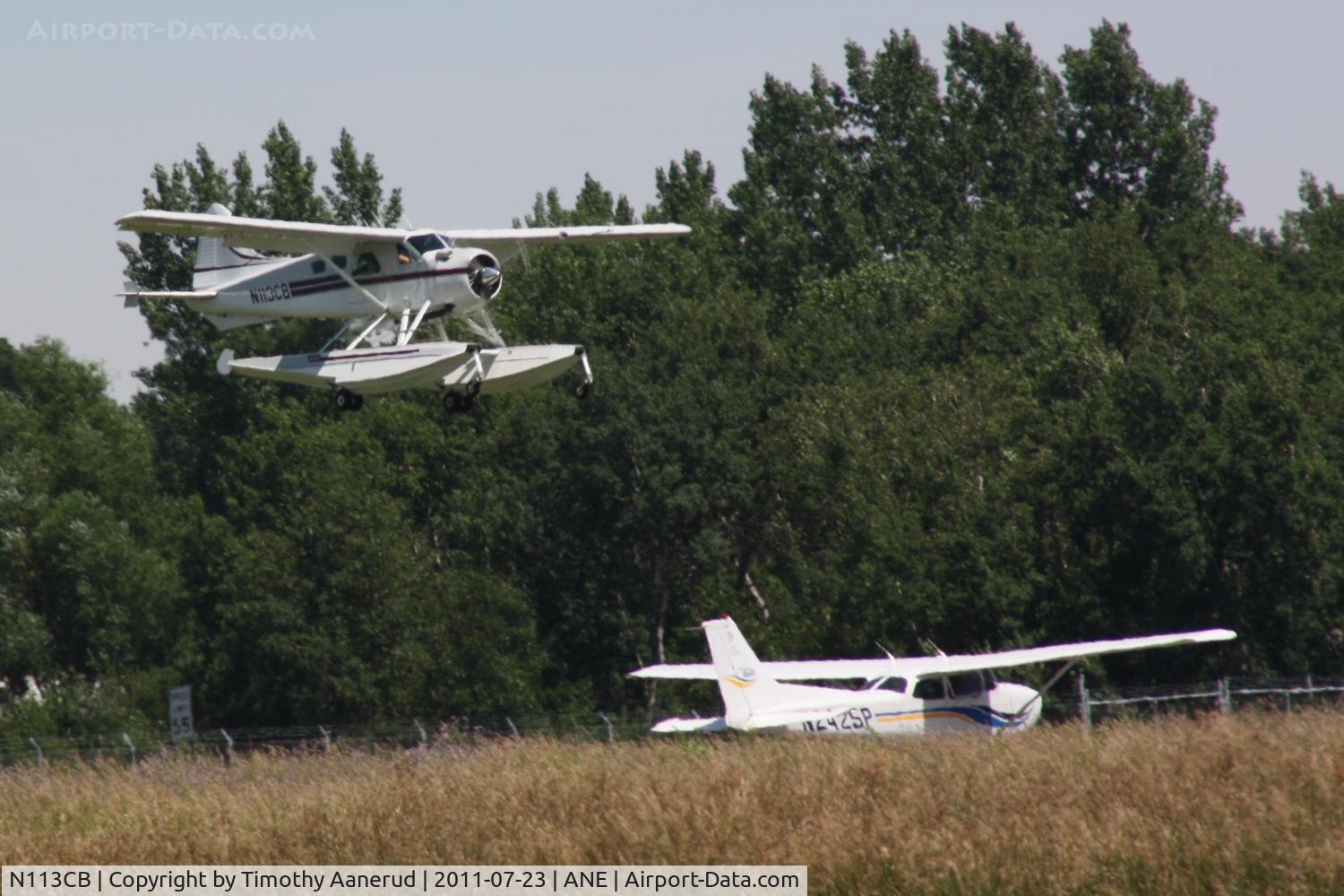 N113CB, 1961 De Havilland Canada DHC-2 C/N 1491, 1961 Dehavilland DHC-2, c/n: 1491.  The C-172 is holding short