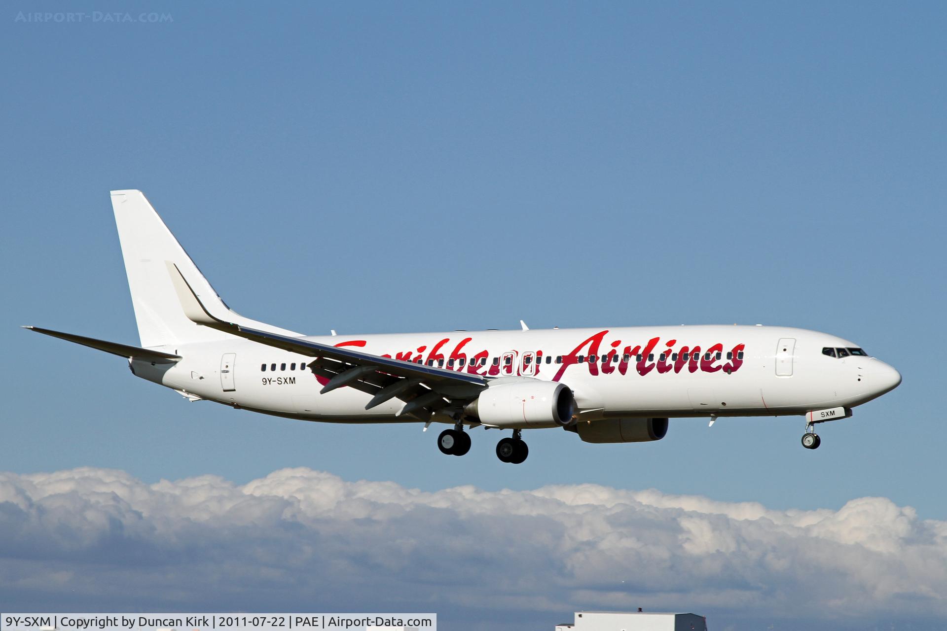 9Y-SXM, 2011 Boeing 737-8HO C/N 37935, Touch and go on 16R