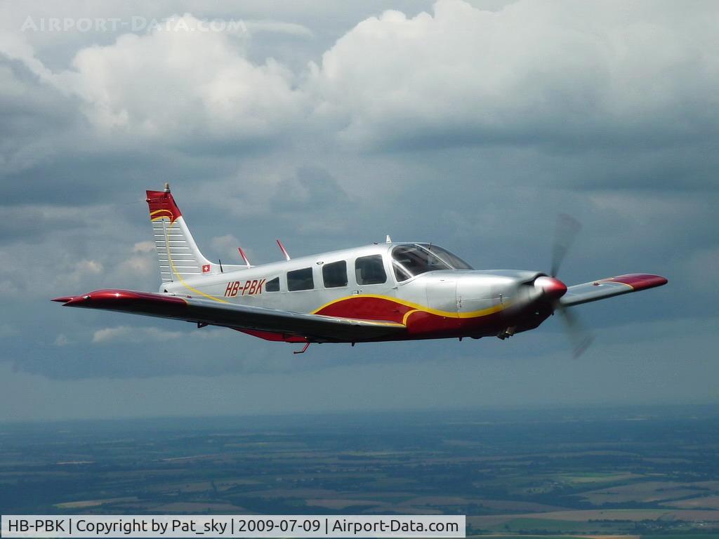 HB-PBK, 1976 Piper PA-32R-300 Cherokee Lance C/N 32R-7780141, In flight over France with its new painting in 2009