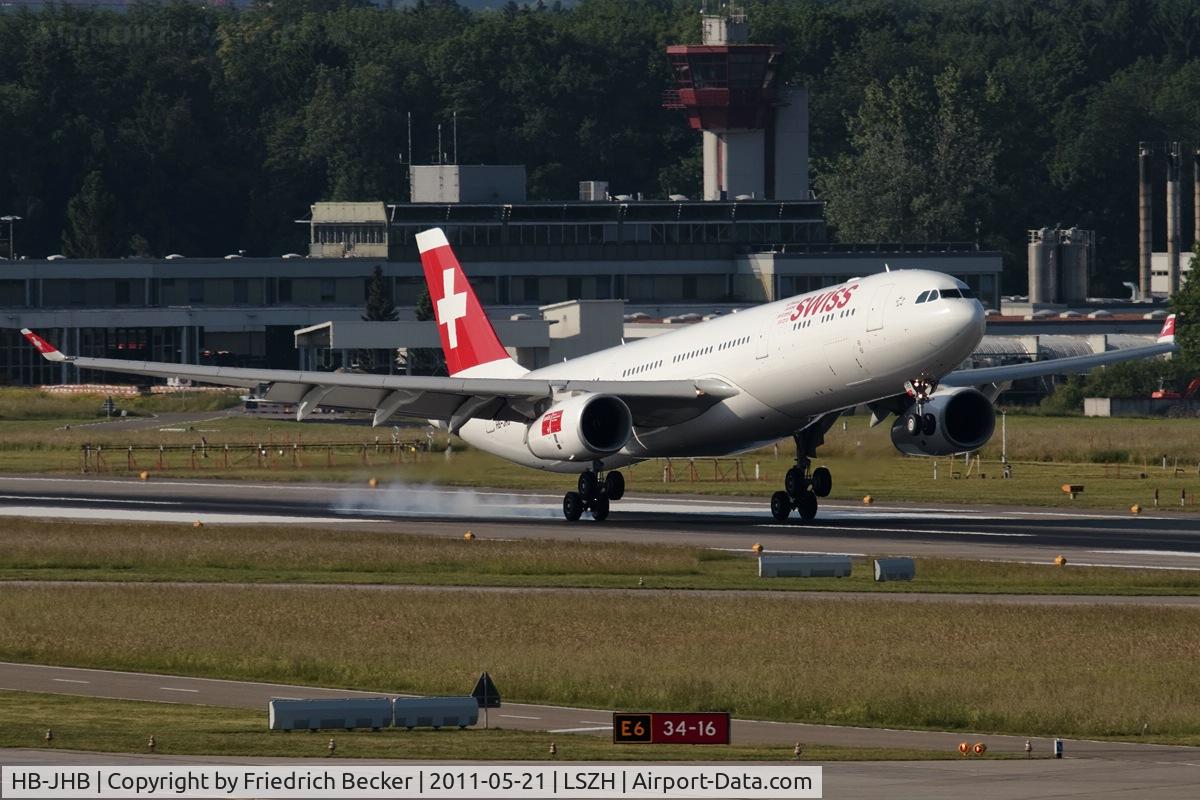 HB-JHB, 2009 Airbus A330-343X C/N 1018, touchdown on RW34