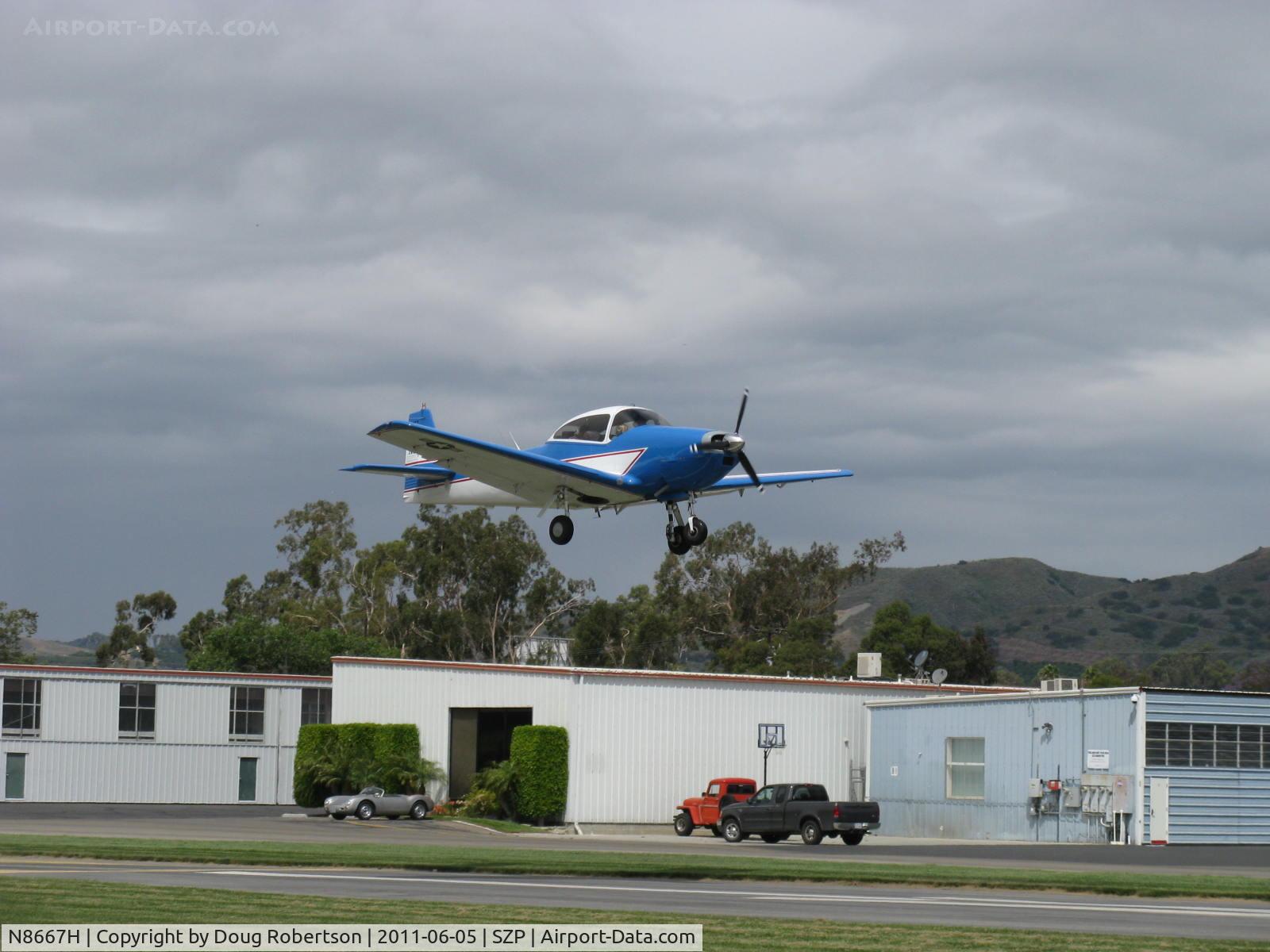 N8667H, 1947 North American Navion C/N NAV-4-667, 1947 North American NAVION, Continental IO-520 285 Hp upgrade, on final Rwy 04 with Young Eagles riders