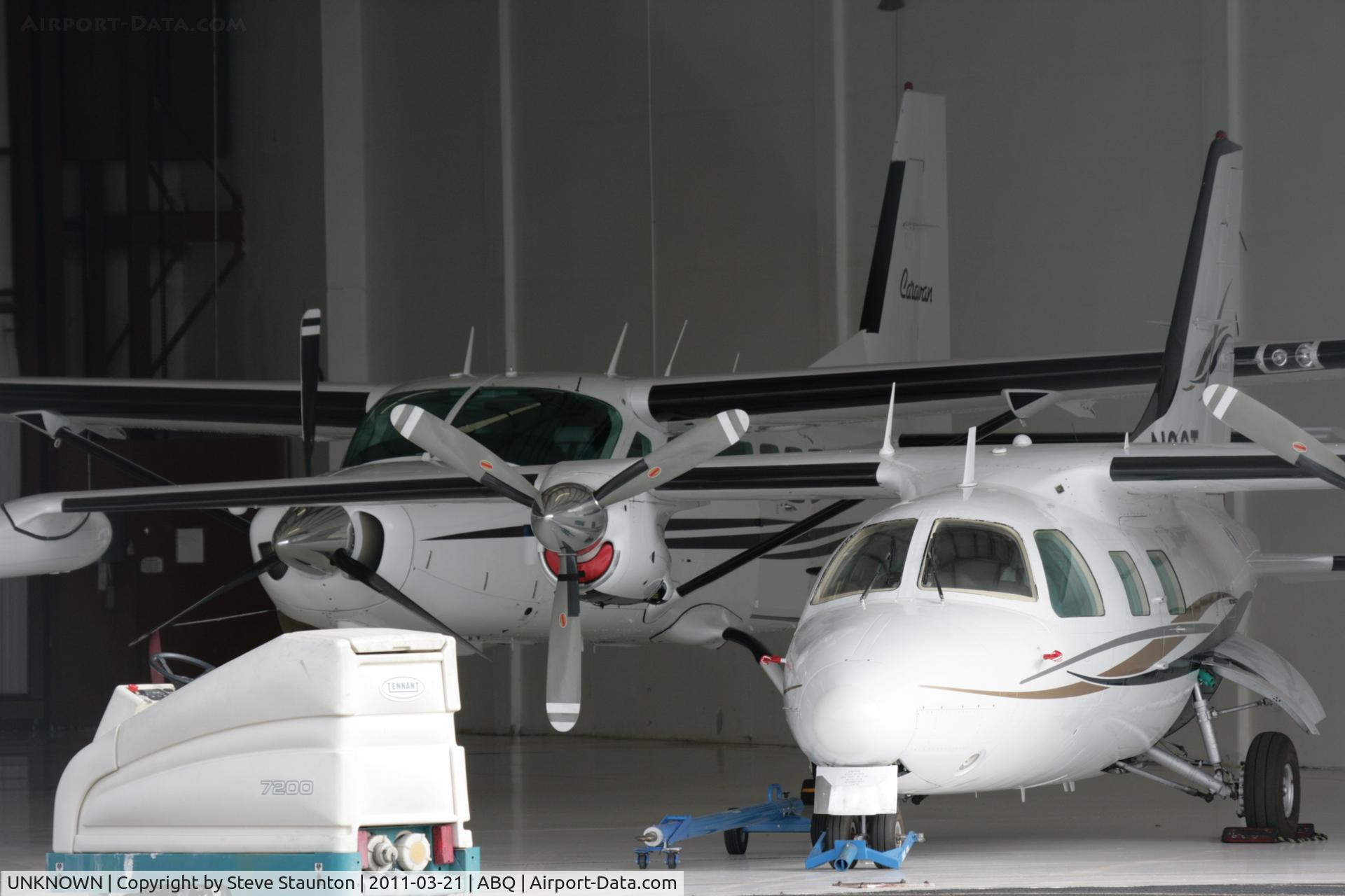 UNKNOWN, Miscellaneous Various C/N unknown, Taken at Alburquerque International Sunport Airport, New Mexico in March 2011 whilst on an Aeroprint Aviation tour - unknown Cessna 208 hiding in the hangar