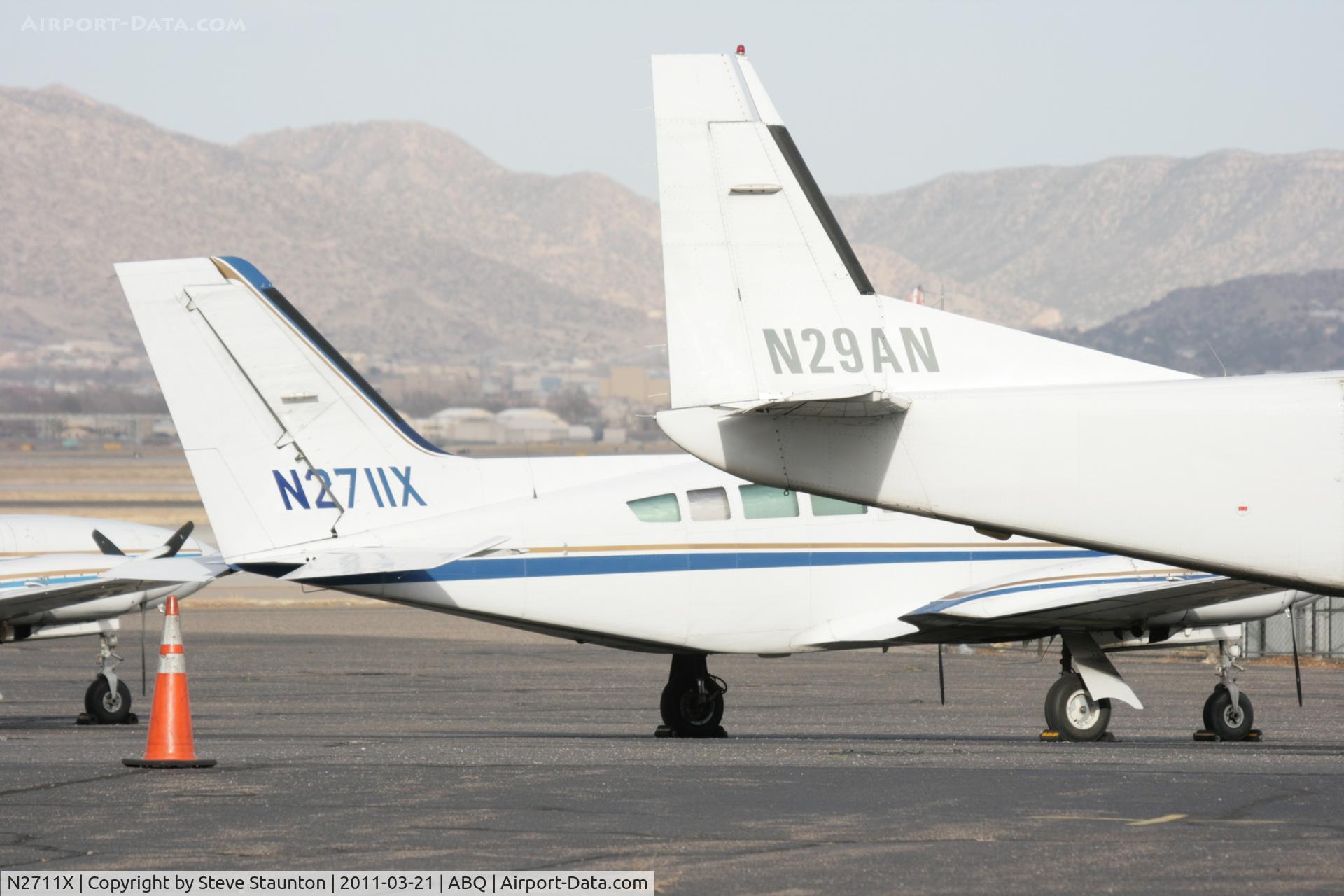 N2711X, 1979 Cessna 402C C/N 402C0116, Taken at Alburquerque International Sunport Airport, New Mexico in March 2011 whilst on an Aeroprint Aviation tour
