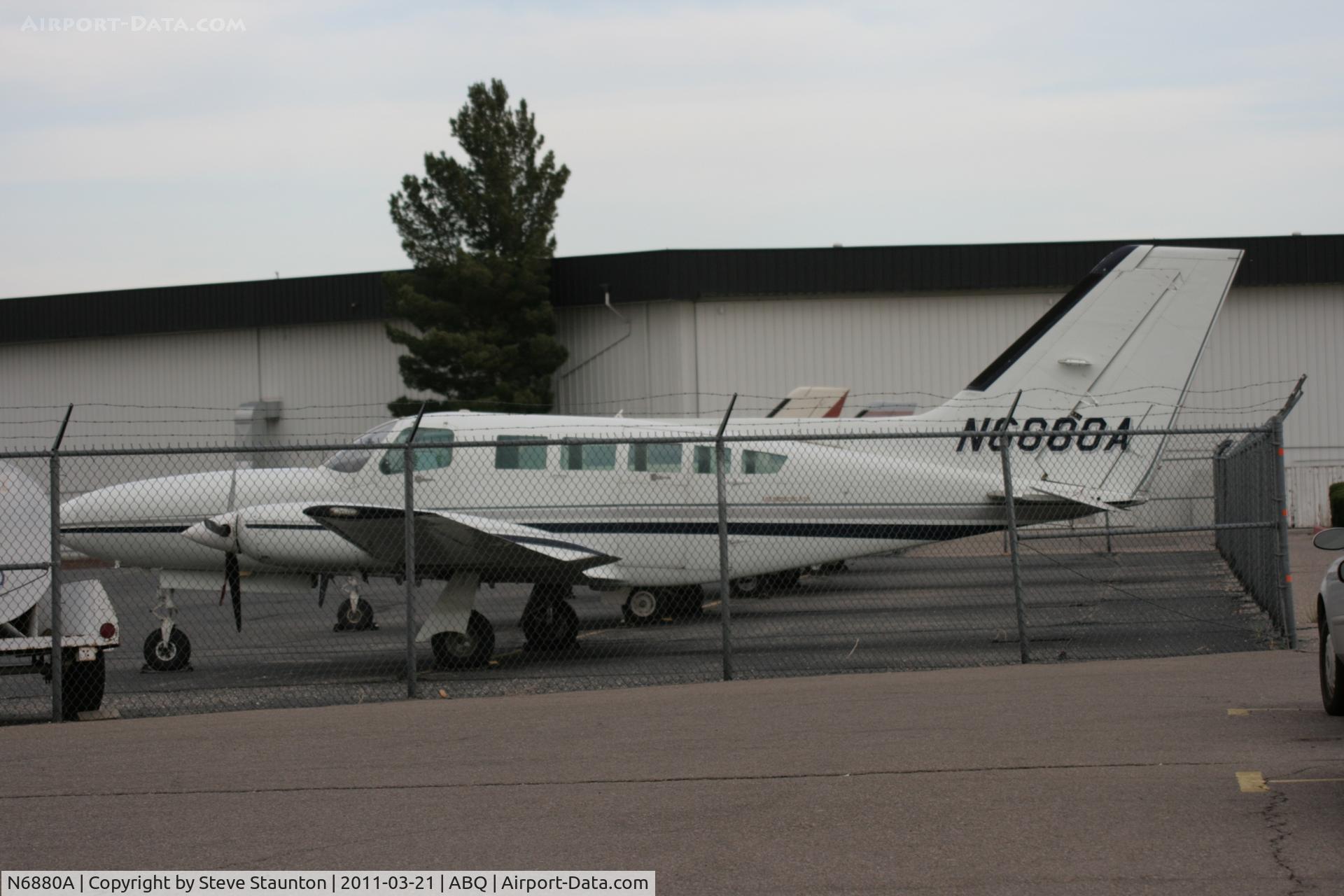 N6880A, 1981 Cessna 402C C/N 402C0616, Taken at Alburquerque International Sunport Airport, New Mexico in March 2011 whilst on an Aeroprint Aviation tour
