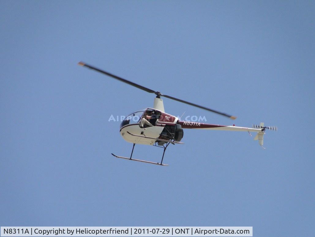 N8311A, 1994 Robinson R22 Beta C/N 2442, Shooting landings in between 737 take offs and landings