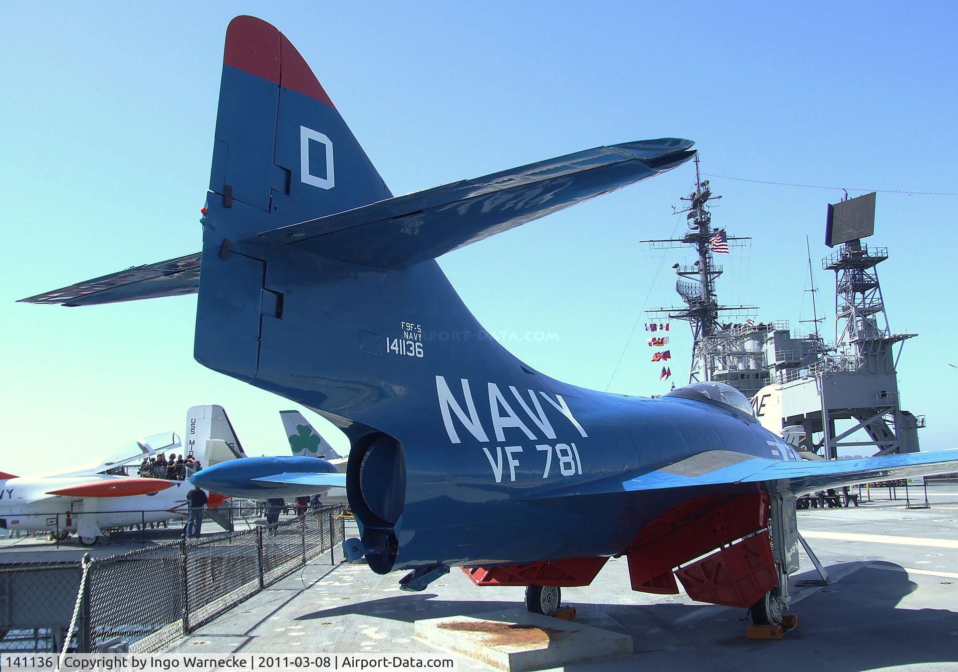 141136, Grumman F9F-8 Cougar C/N Not found 141136, Grumman F9F-5 Panther on the flight deck of the USS Midway Museum, San Diego CA