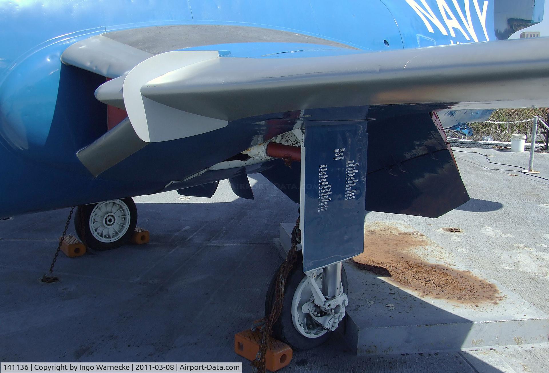 141136, Grumman F9F-8 Cougar C/N Not found 141136, Grumman F9F-5 Panther on the flight deck of the USS Midway Museum, San Diego CA