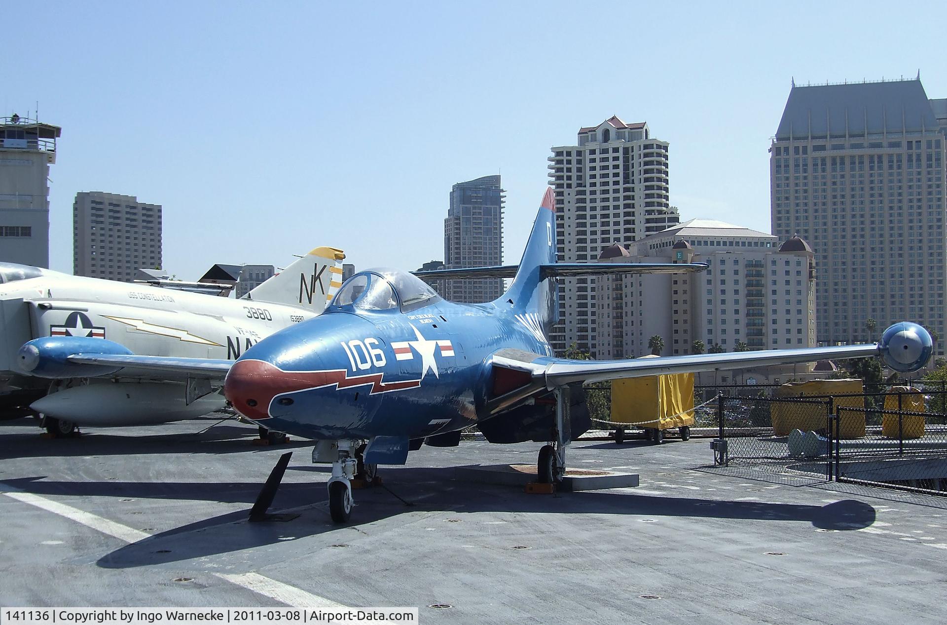141136, Grumman F9F-8 Cougar C/N Not found 141136, Grumman F9F-5 Panther on the flight deck of the USS Midway Museum, San Diego CA