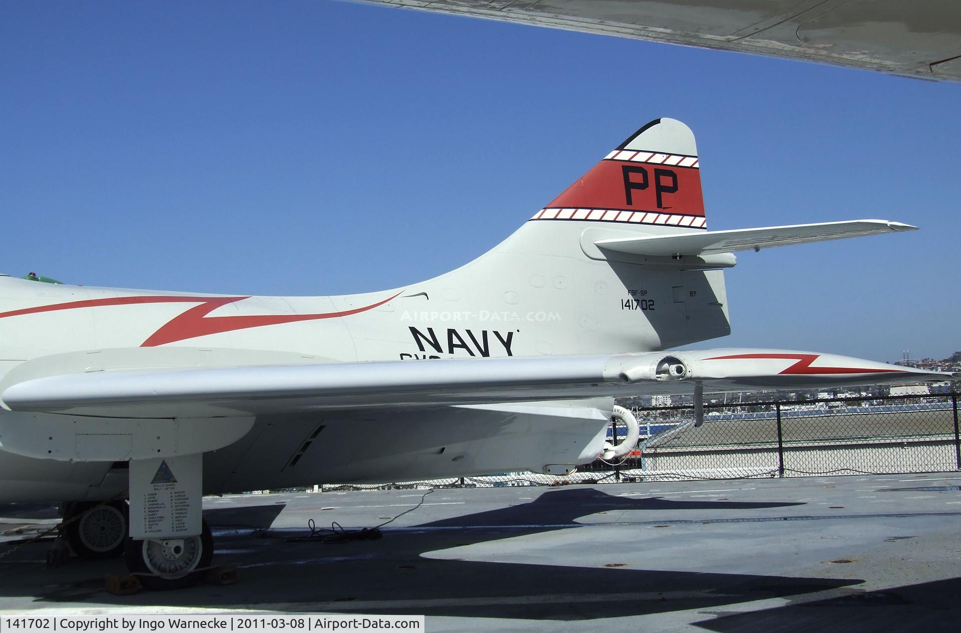 141702, Grumman F9F-8P Cougar C/N Not found 141702, Grumman F9F-8P Cougar on the flight deck of the USS Midway Museum, San Diego CA