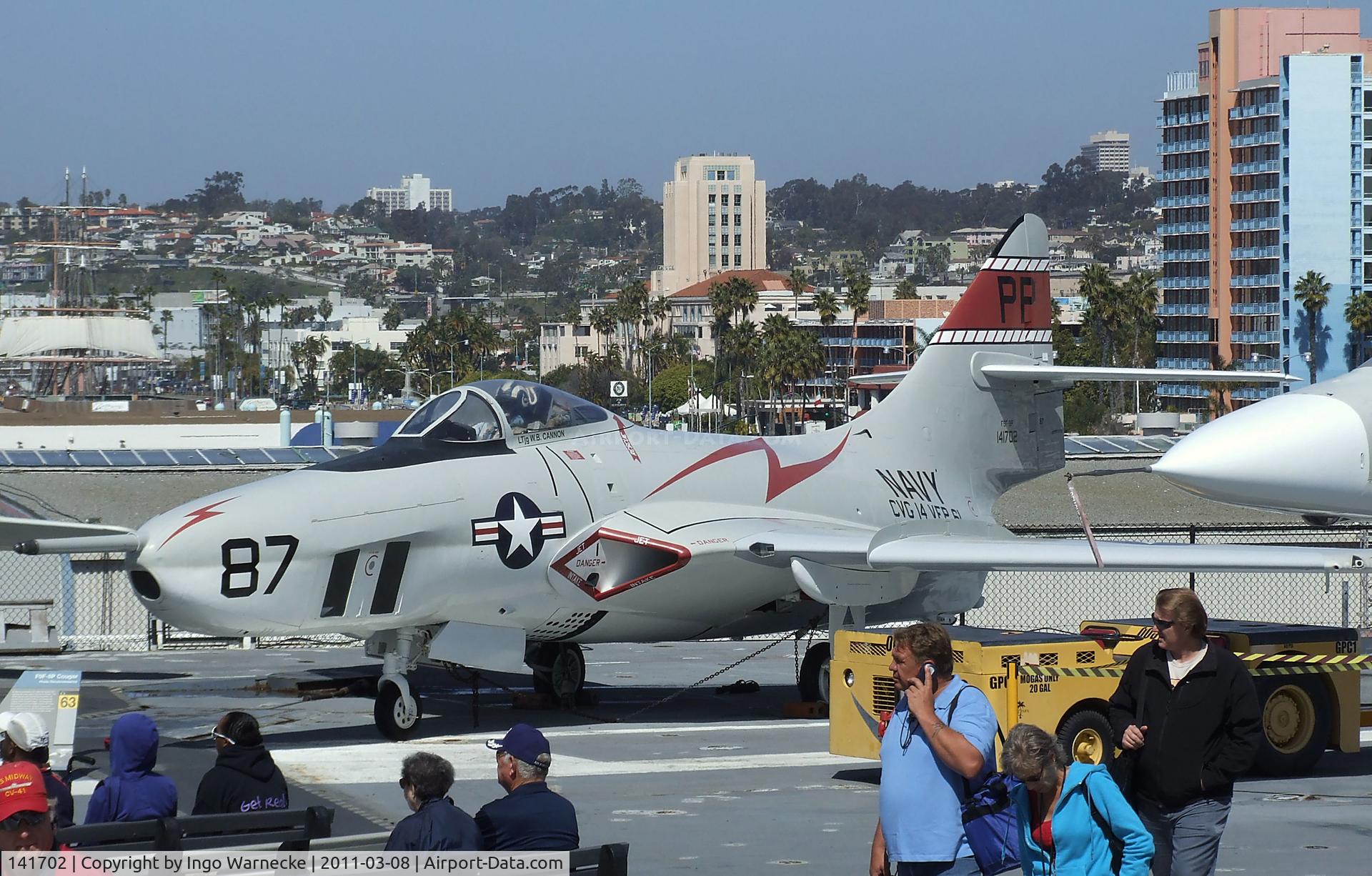 141702, Grumman F9F-8P Cougar C/N Not found 141702, Grumman F9F-8P Cougar on the flight deck of the USS Midway Museum, San Diego CA