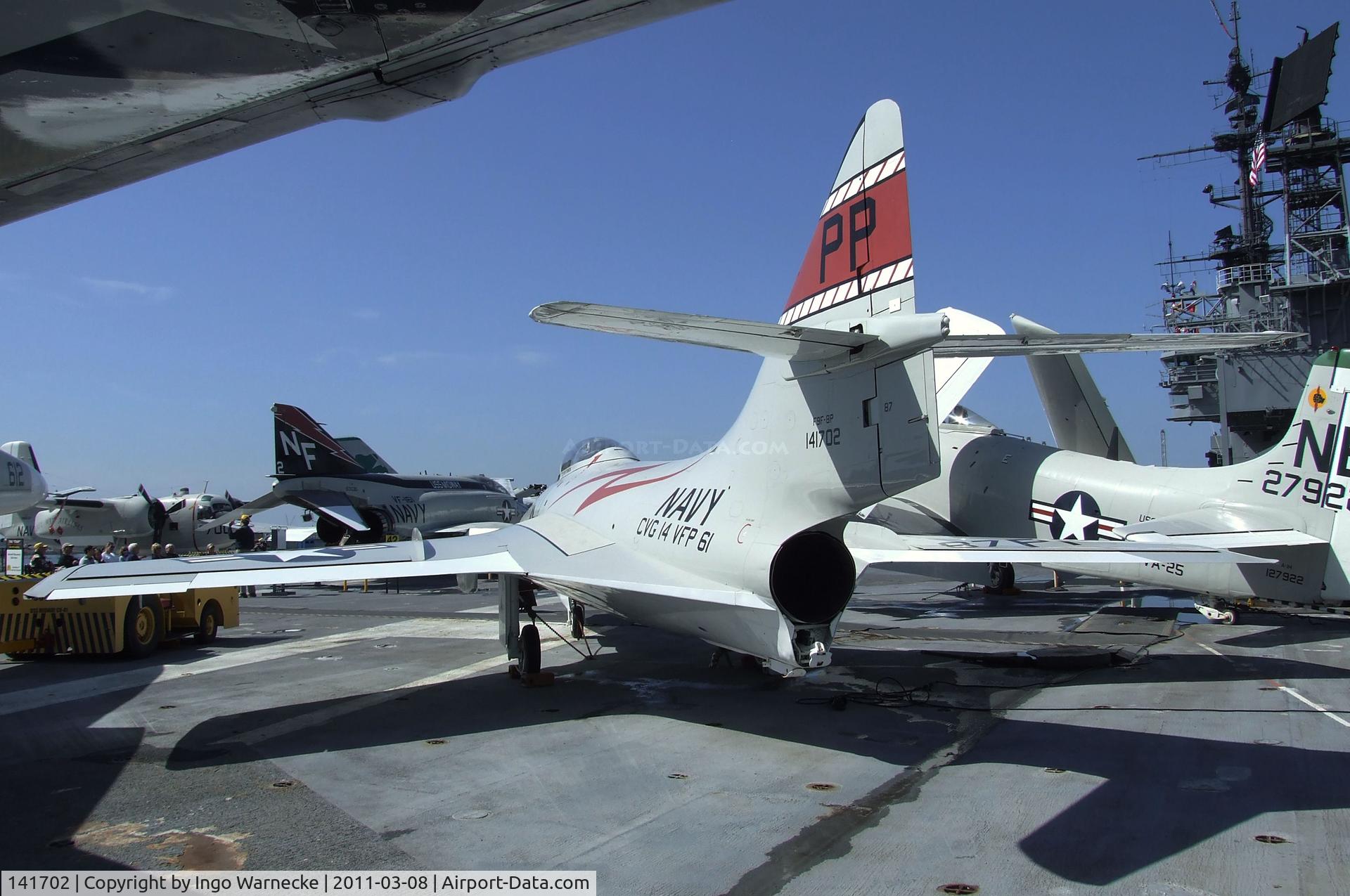 141702, Grumman F9F-8P Cougar C/N Not found 141702, Grumman F9F-8P Cougar on the flight deck of the USS Midway Museum, San Diego CA