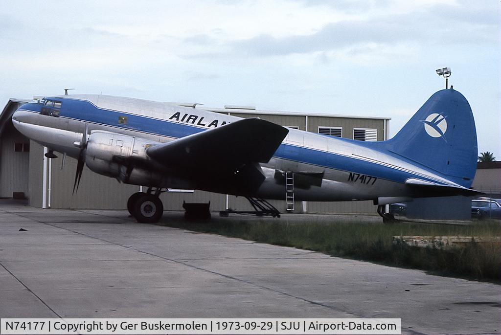 N74177, 1945 Curtiss C-46F Commando C/N 22596, Taken at San Juan Luis Munoz Marin  Airport in September 1973